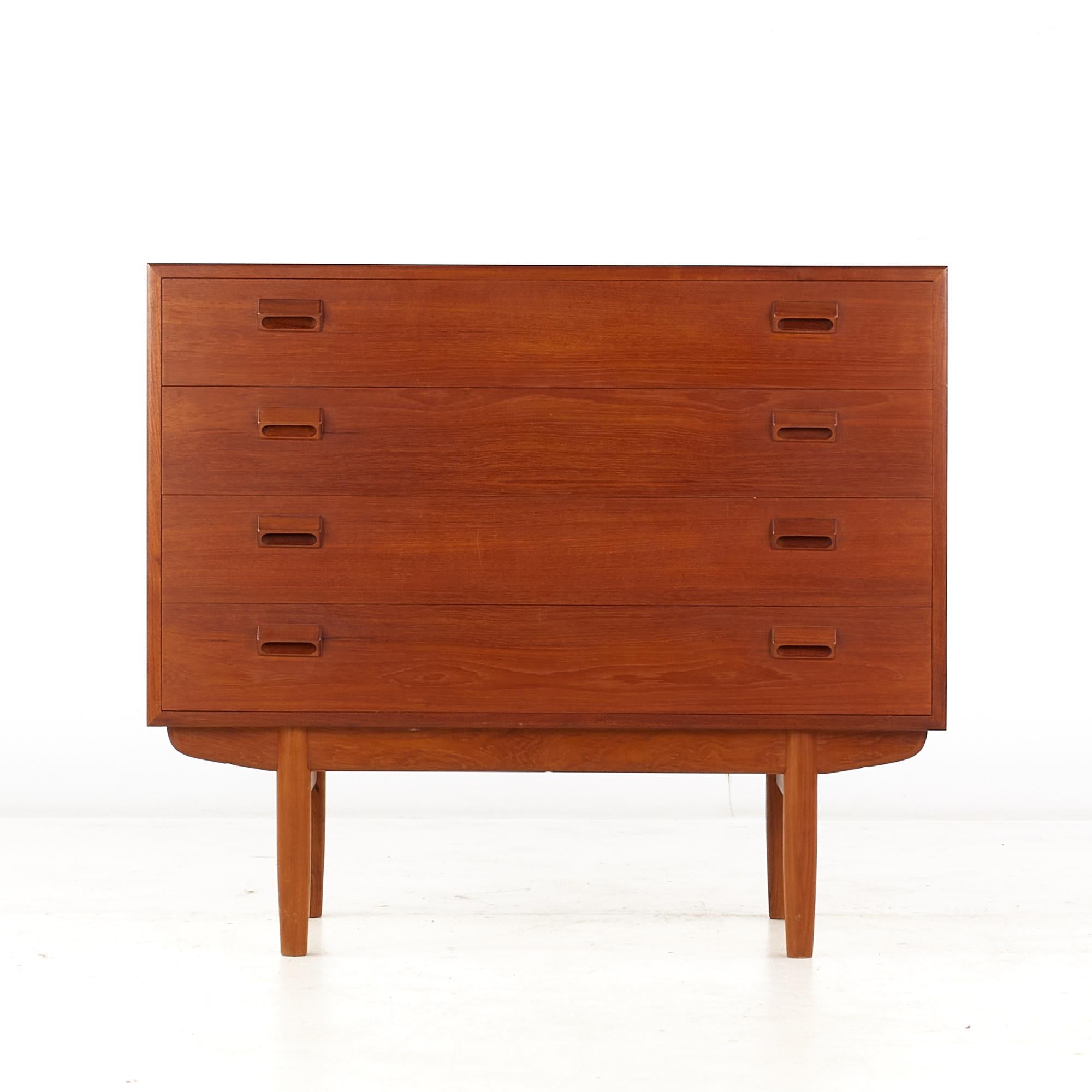 Borge Mogensen for Soborg Mobler Mid Century Danish Teak 4 drawer dresser Chest

This dresser measures: 39.25 wide x 18 deep x 34.25 inches high

All pieces of furniture can be had in what we call restored vintage condition. That means the piece