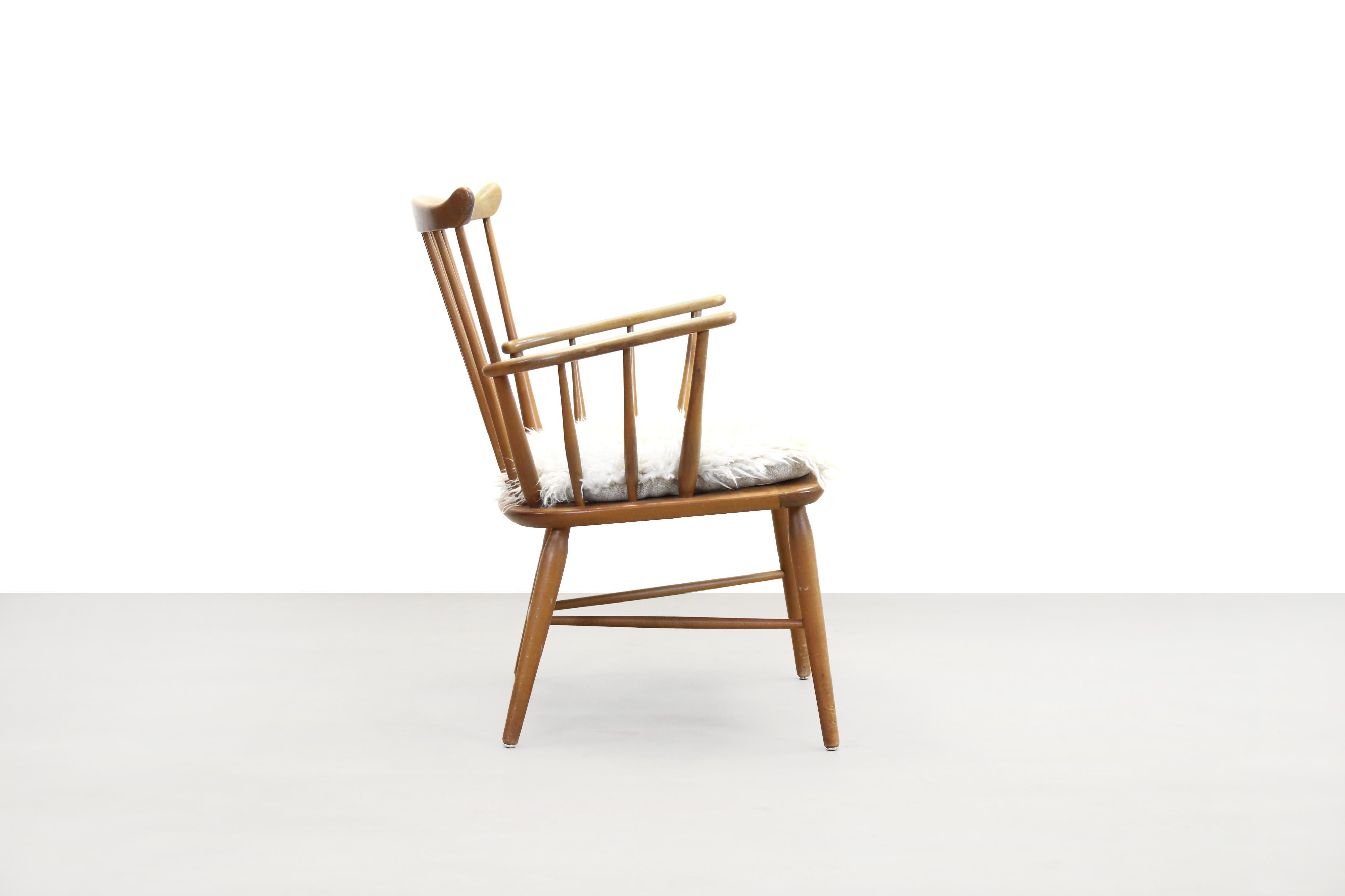 Beautiful beechwood design armchair designed by Borge Mogensen and produced by FDB Mobler, in Denmark in the 1960s. The famous designer from Denmark is known for his sustainable and sober shaker style furniture. Today, Mogensen's furniture is so