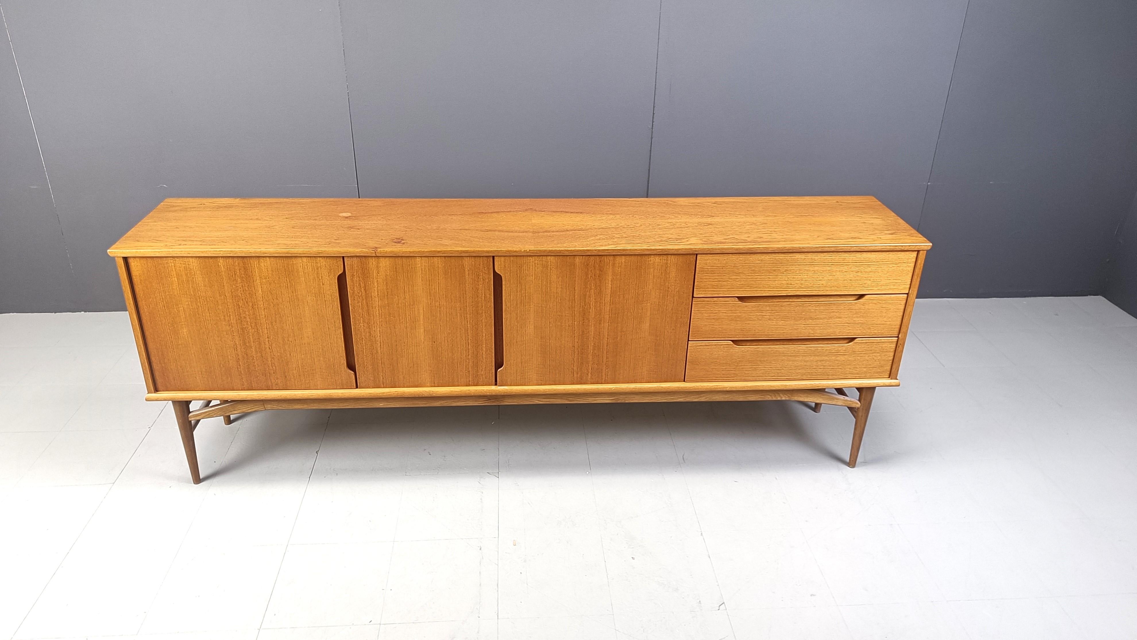 
Fantastic mid century scandinavian sideboard designed by Broge Mogensen for fredericia stolefabric.

The beauty, elegance and use of fantastic materials really makes this sideboard stand out.
It features 3 doors and three drawers.

Very good