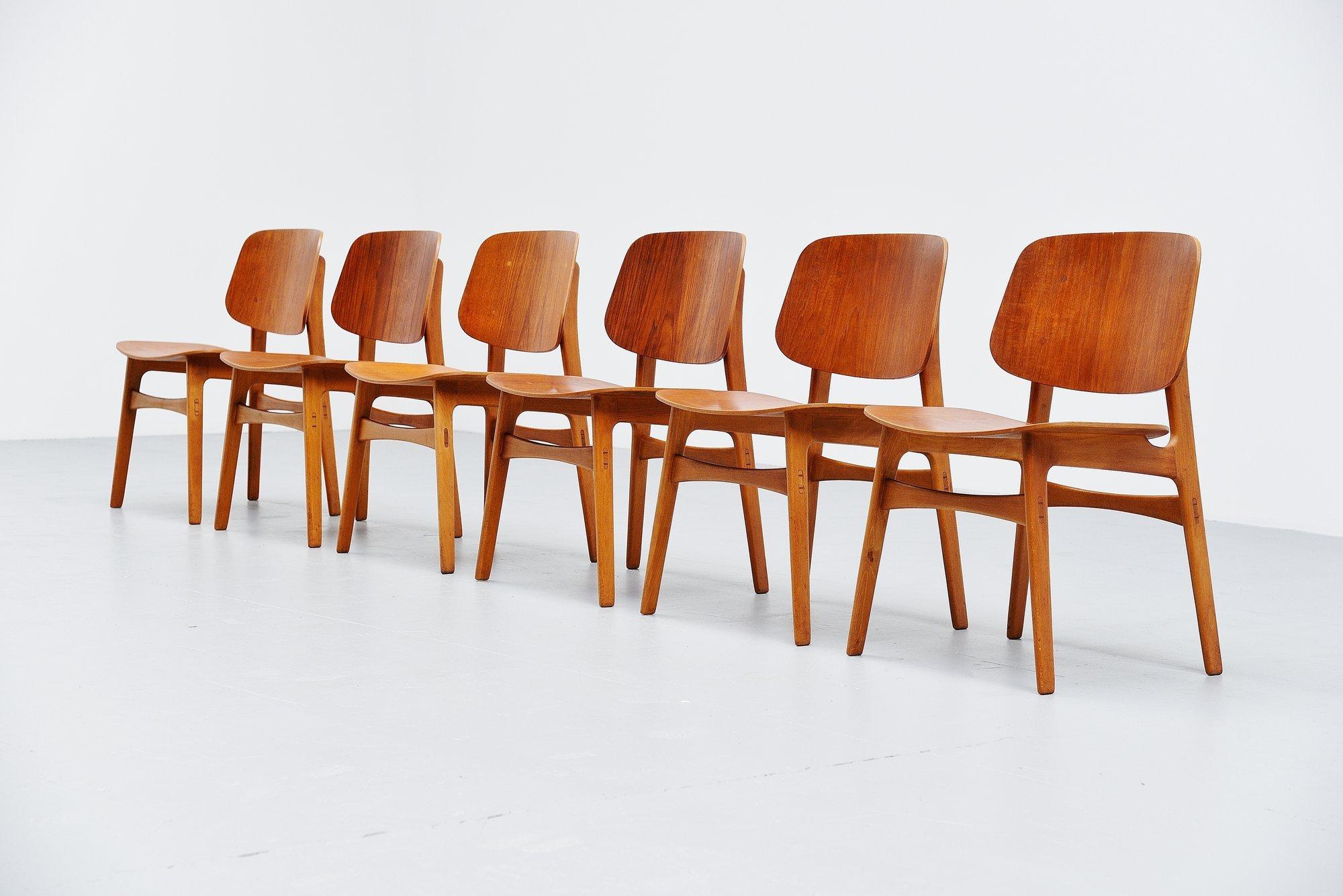 Fantastic set of 6 plywood dining chairs designed by Borge Mogensen and manufactured by Soborg Mobelfabrik, Denmark 1949. These amazing chairs are made of teak plywood seats and backs and have beech wood frames. These chairs are beautifully