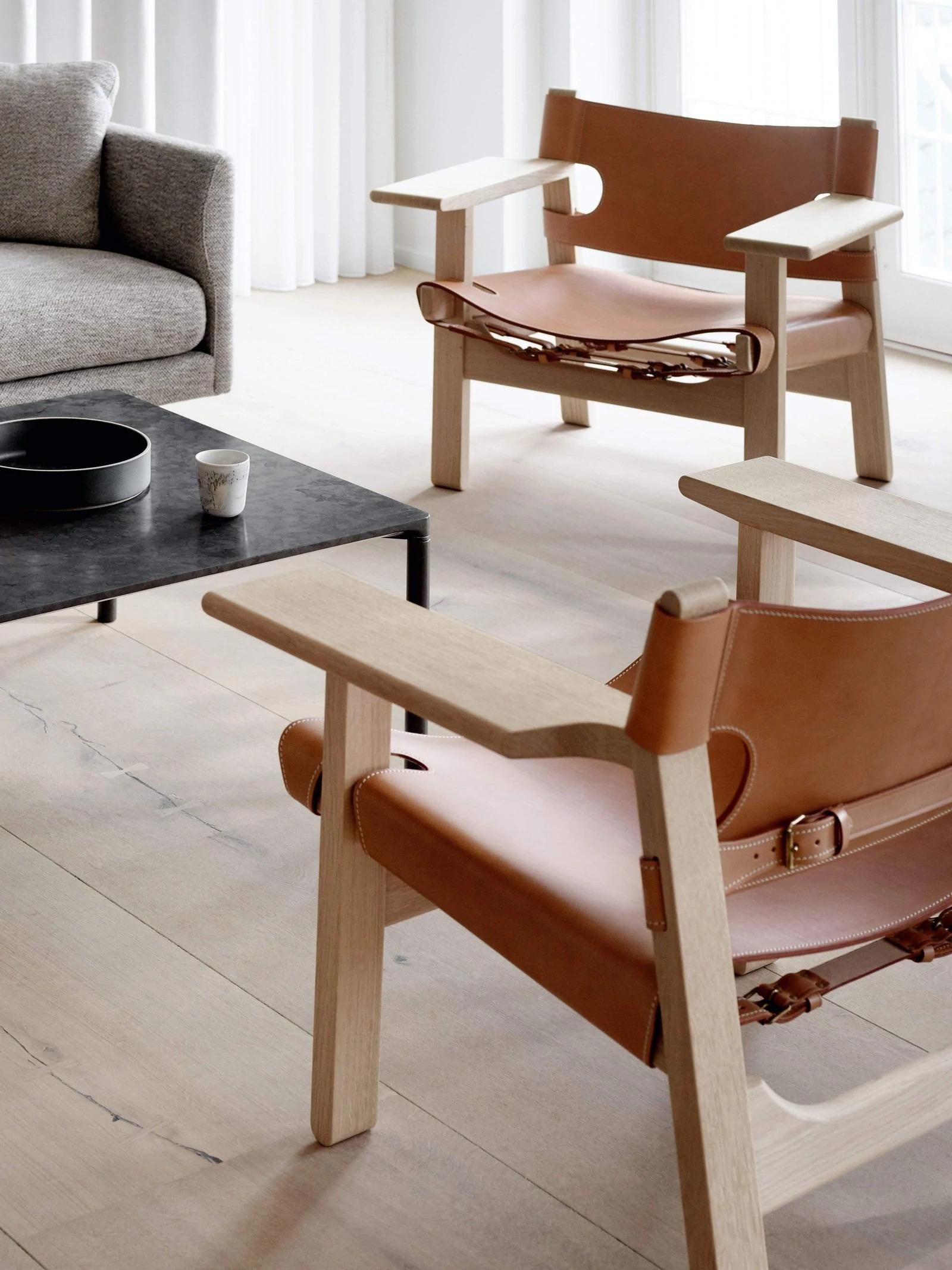 In 1958, Børge Mogensen and his family travelled to Spain. In Andalucia he fell in love with an old chair with a wide seat and broad armrests. Once back in Denmark, he created The Spanish Chair.

The chair he fell in love with is a traditional