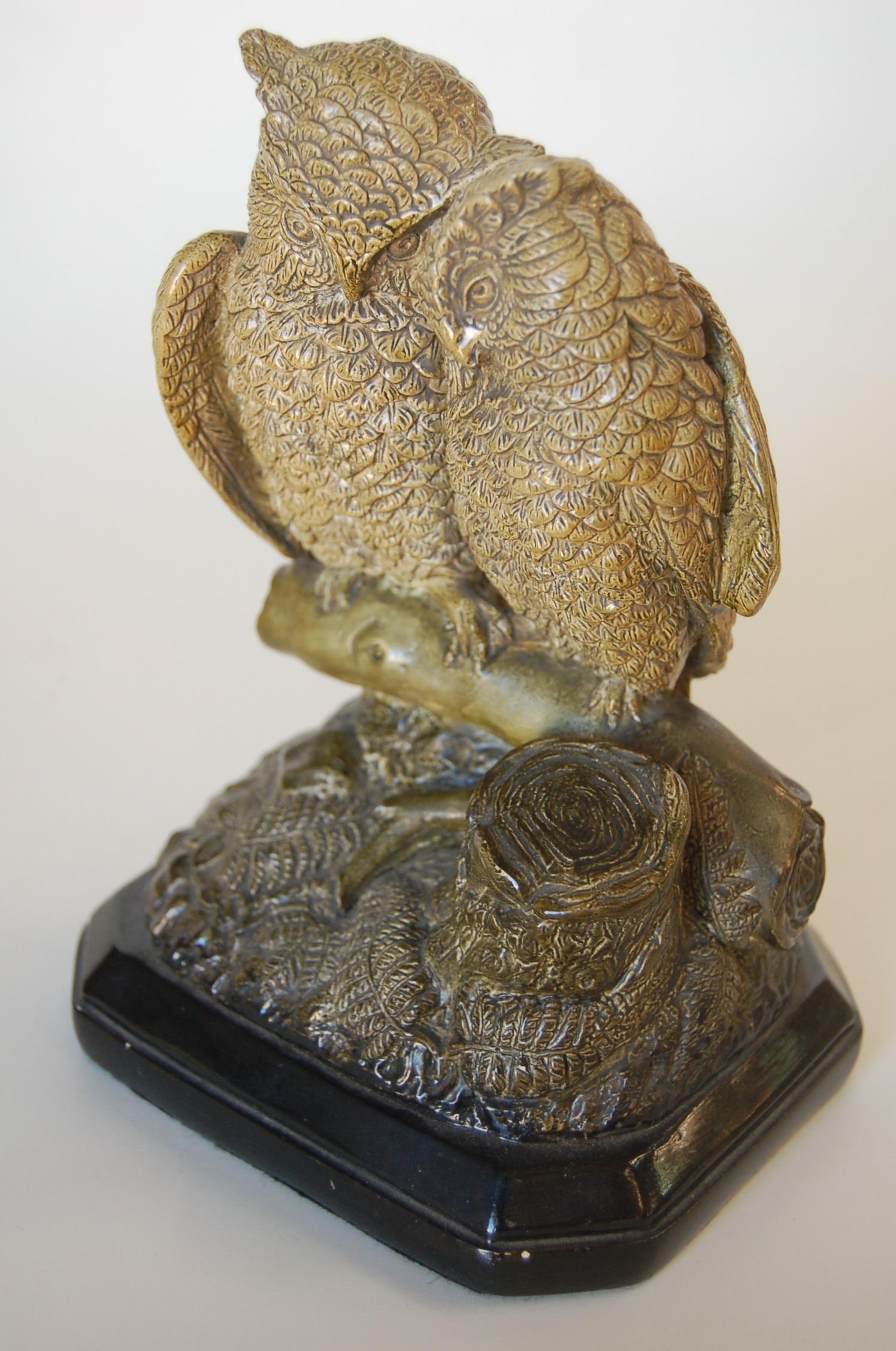 Borghese English Victorian period Majolica owl couple figurine. Registry date of November 9, 1871. Table two registry mark on the back. The nuzzling owls note the protective wing that one has stretched over the others back, are perched on a log next