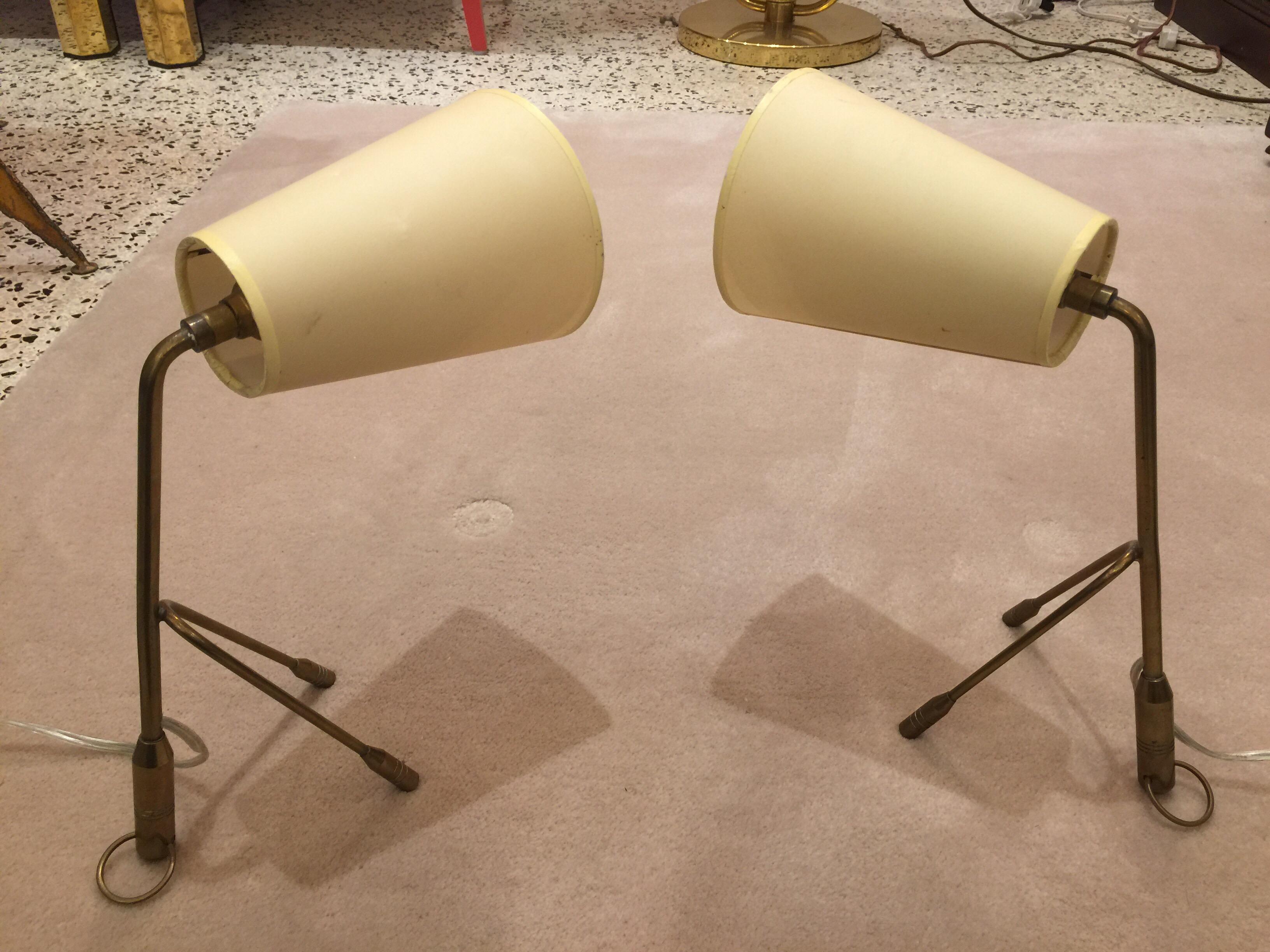 Boris Lacroix pair of wonderful vintage and original brass tri-pod table lamps, circa 1950. The small rings can also be used to hang these beauties on the wall as sconces.