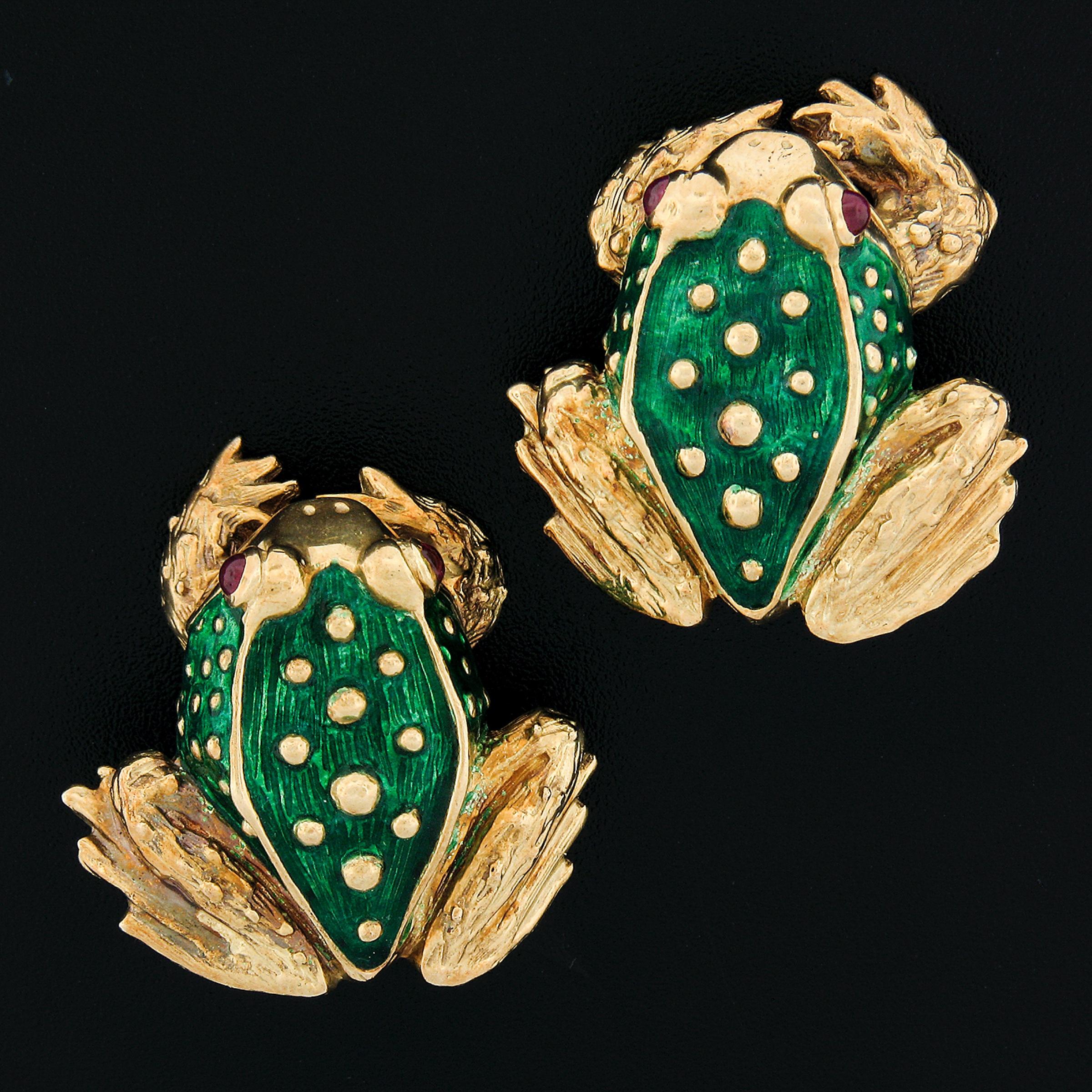 Here we have a pair of substantial and well detailed frog earrings designed by Boris Le Beau and crafted in solid 18k yellow gold. The adorable frogs are covered in gorgeous green enamel throughout their body with visible textured gold work