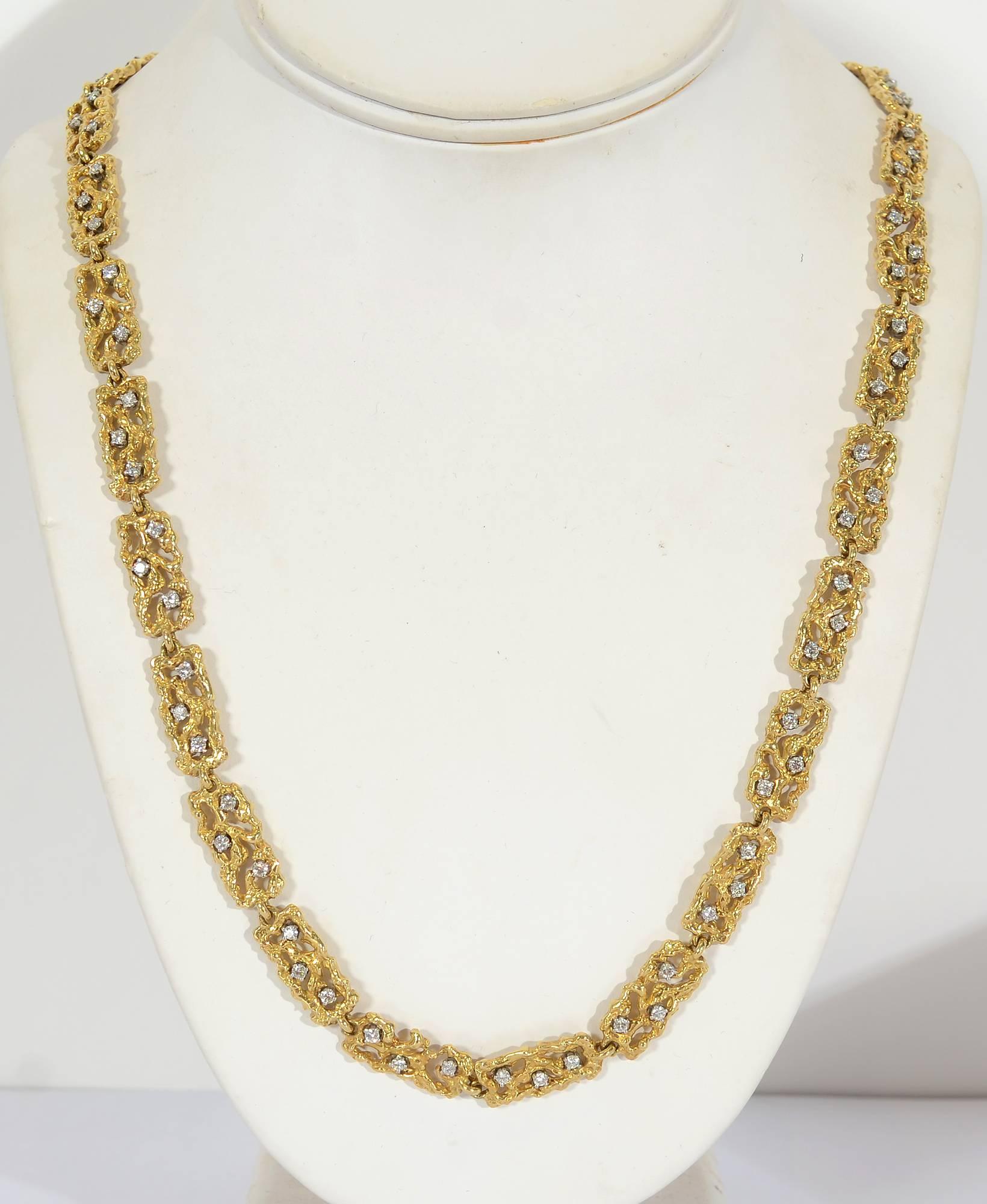 Boris Le Beau gold chain necklace with openwork rectangular links. Each has three round diamonds with a total weight of approximately 3.2 carats. Length is 24 inches; width is 3/8
