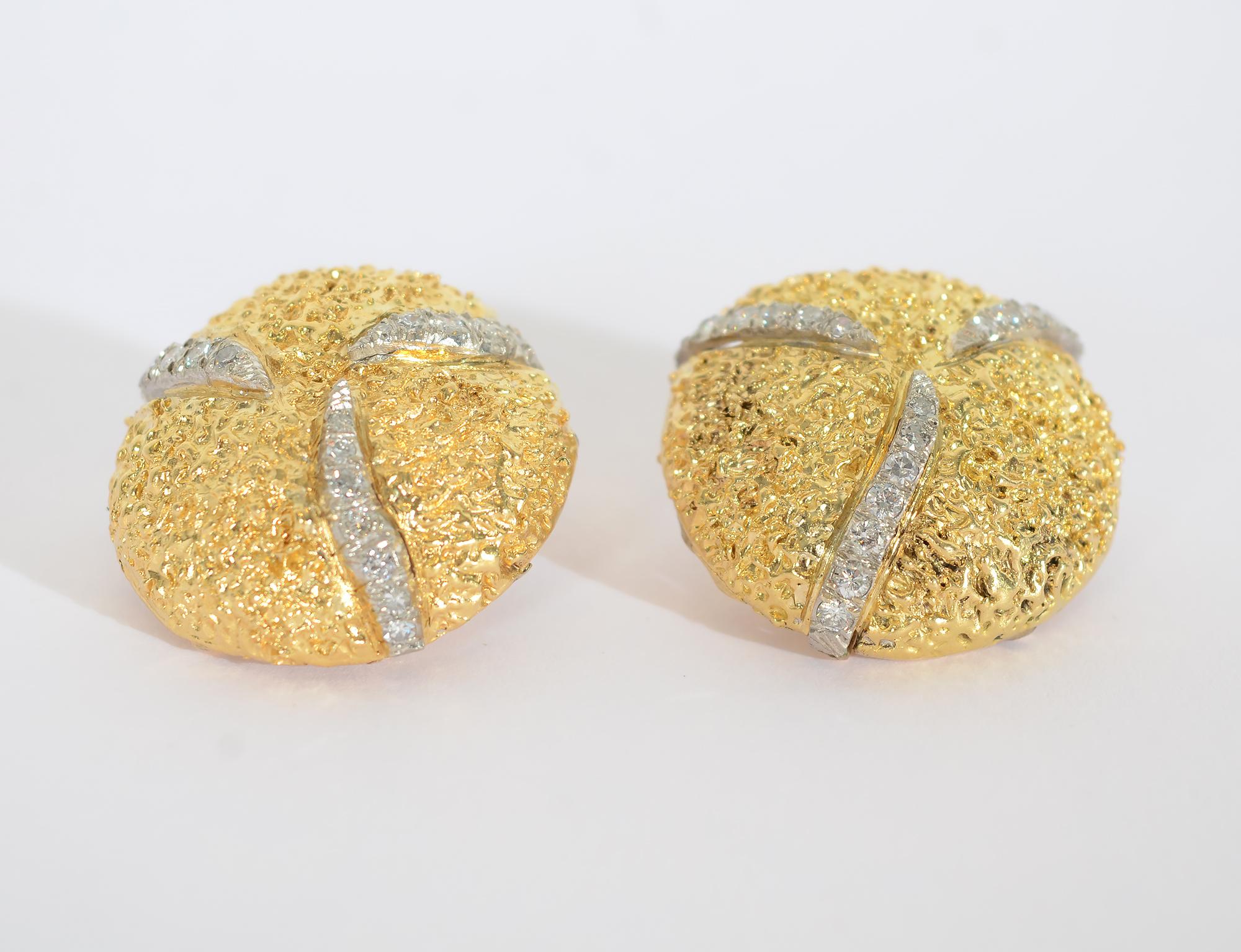 Wonderfully textured earrings by the late jewelry designer and sculptor, Boris Le Beau. LeBeau had a store on Madison Avenue for many years.
These earrings measure 1 inch in diameter. In addition to the finely sculpted texture, each earring has