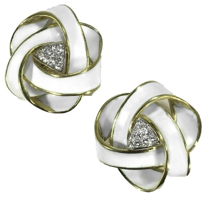 This exciting pair of summer inspired earrings created by well respected artist and jewelry designer Boris LeBeau, is a continuous 1/4 inch wide flowing ribbon of white enamel on yellow gold, with a white gold, diamond set plaque at the center of