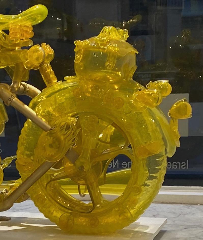 Boris Shpeizman, an glass craftsman, transforms the childhood dreams of men into tangible art, focusing on the yearning for unattained toys and their delicate inner worlds. He crafted a life-size motorcycle entirely from glass, symbolizing the dream