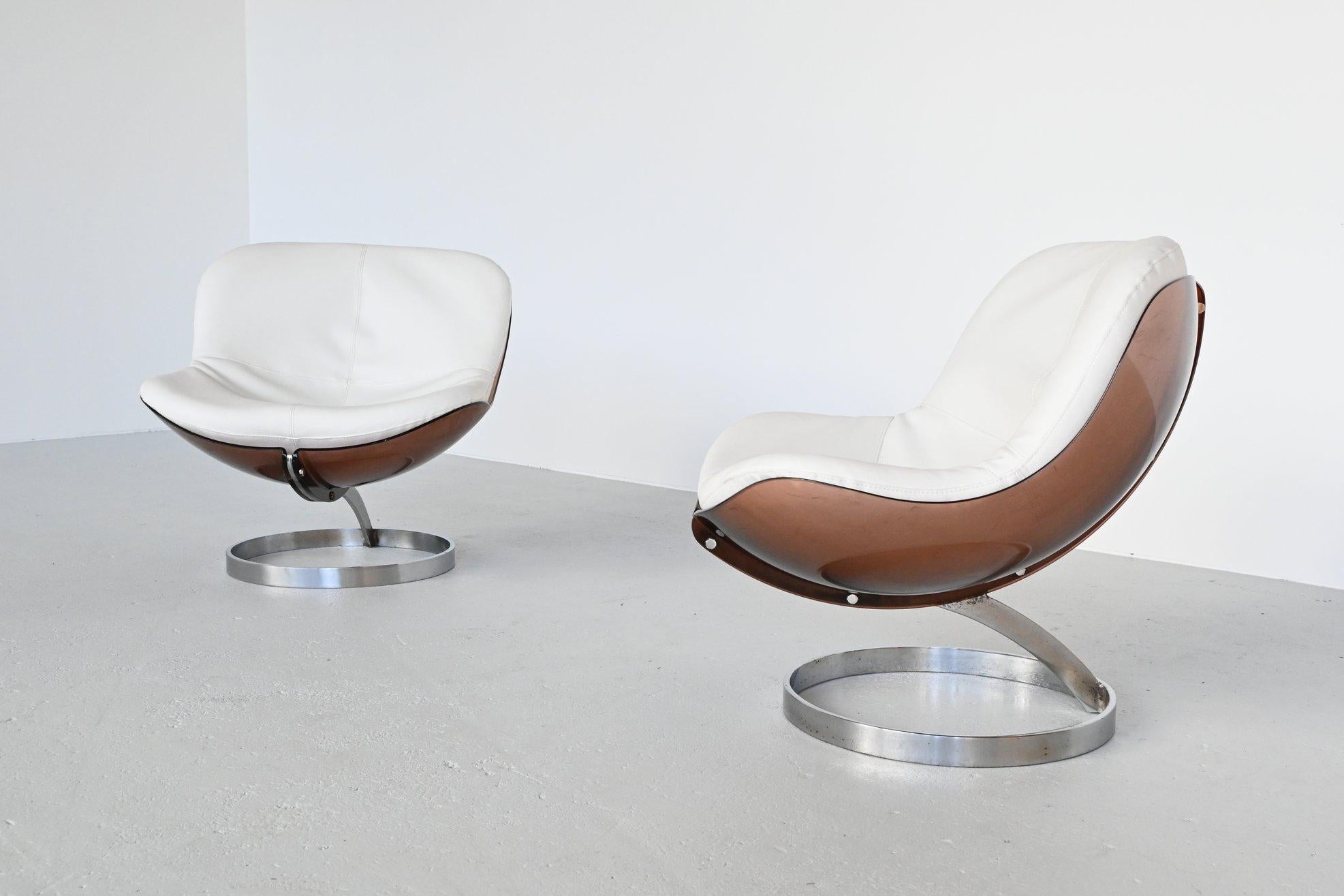 Amazing set of 2 Sphere chairs designed by Boris Tabacoff and manufactured by Mobilier Modulair Moderne, France, 1971. These lounge chairs have a chrome plated metal iconic base and a lightly smoked moulded plexiglass seat with white faux leather