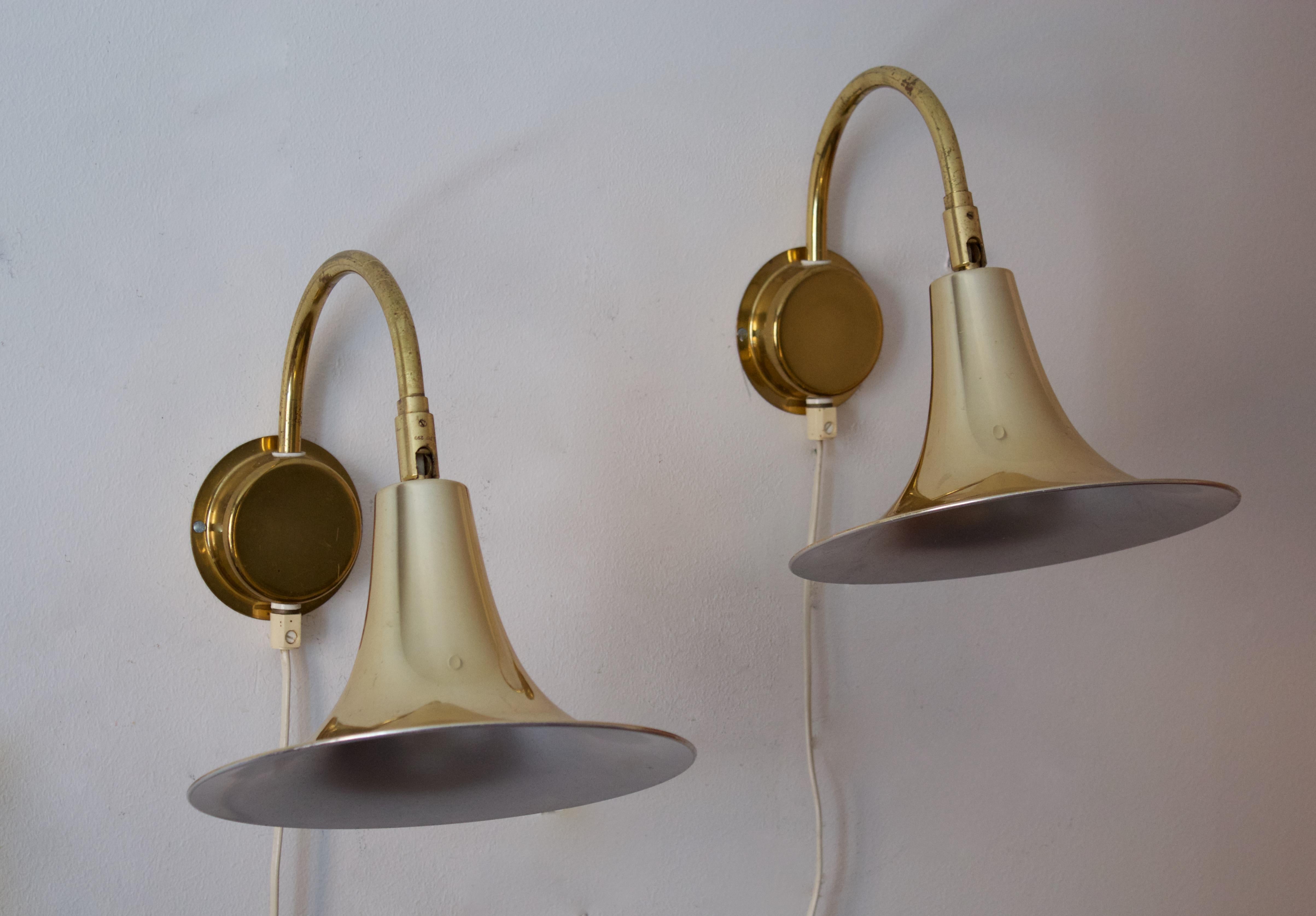 A pair of wall lights. Designed by Börje Claes. Produced by Norlett, Sweden, c. 1970s.
 
  