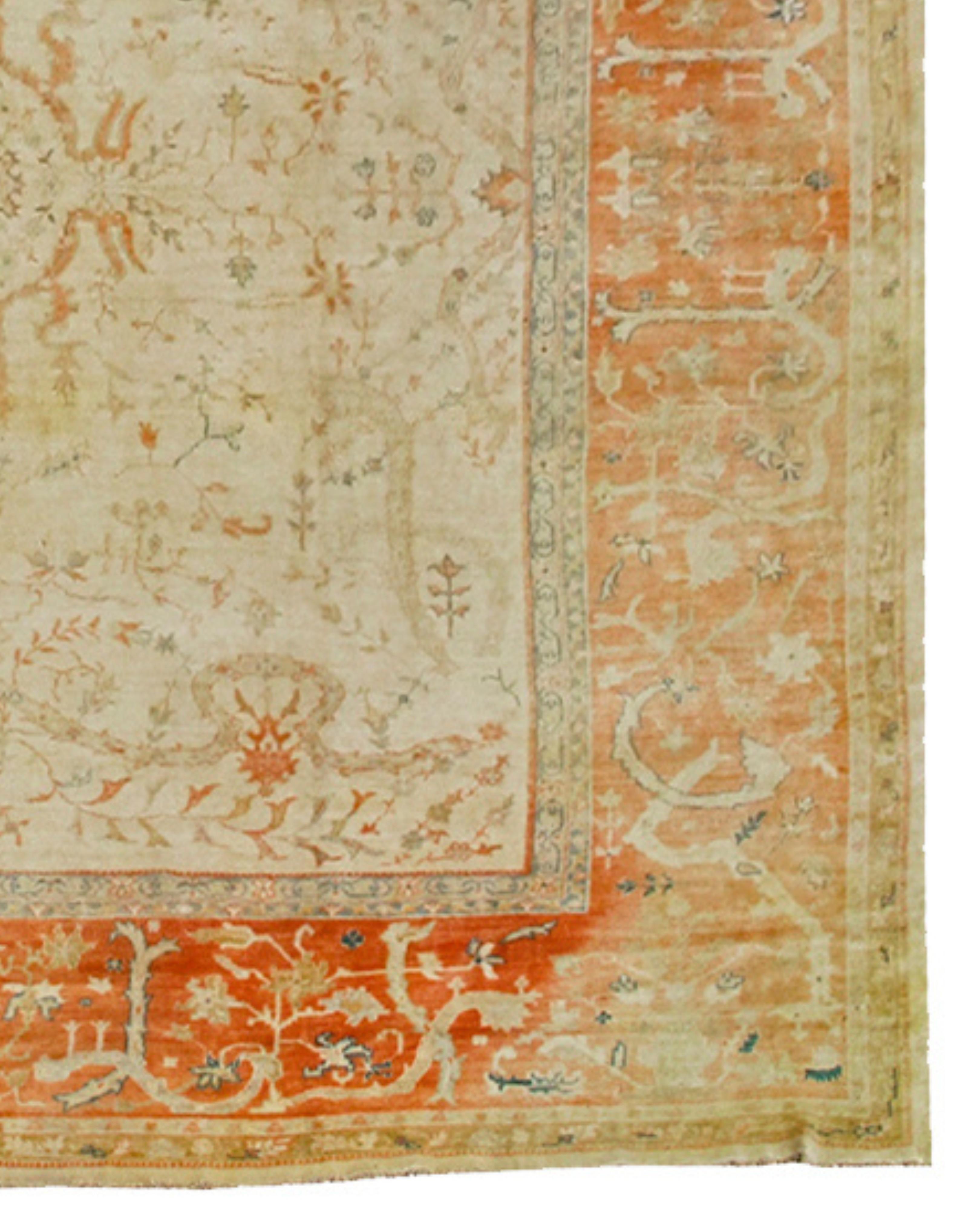 Antique Large Oversized Anatolian Borlu Rug, Early 20th Century

Antique Borlu carpets from western Anatolia combine the soft tones of neighboring Oushak pieces with a sturdier and tighter weave. The pale ivory ground of this piece is framed by an