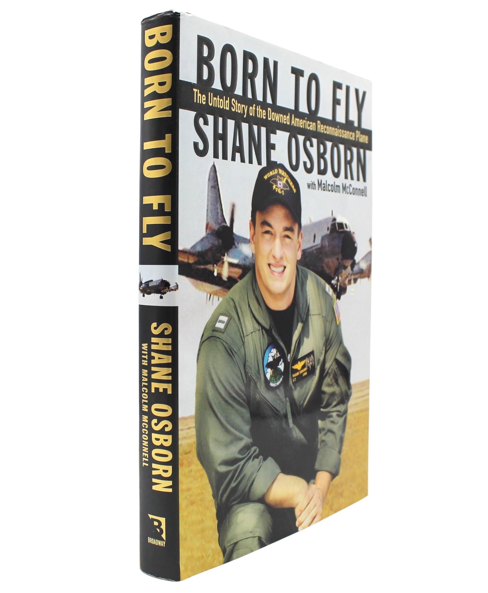Osborne, Shane, McConnell, Malcolm. Born to Fly: The Heroic Story of Downed U.S. Navy Pilot Lt. Shane Osborn. New York: Broadway Books, 2001. First edition, first printing. Signed by Osborne on the full title page. In the publisher's original dust