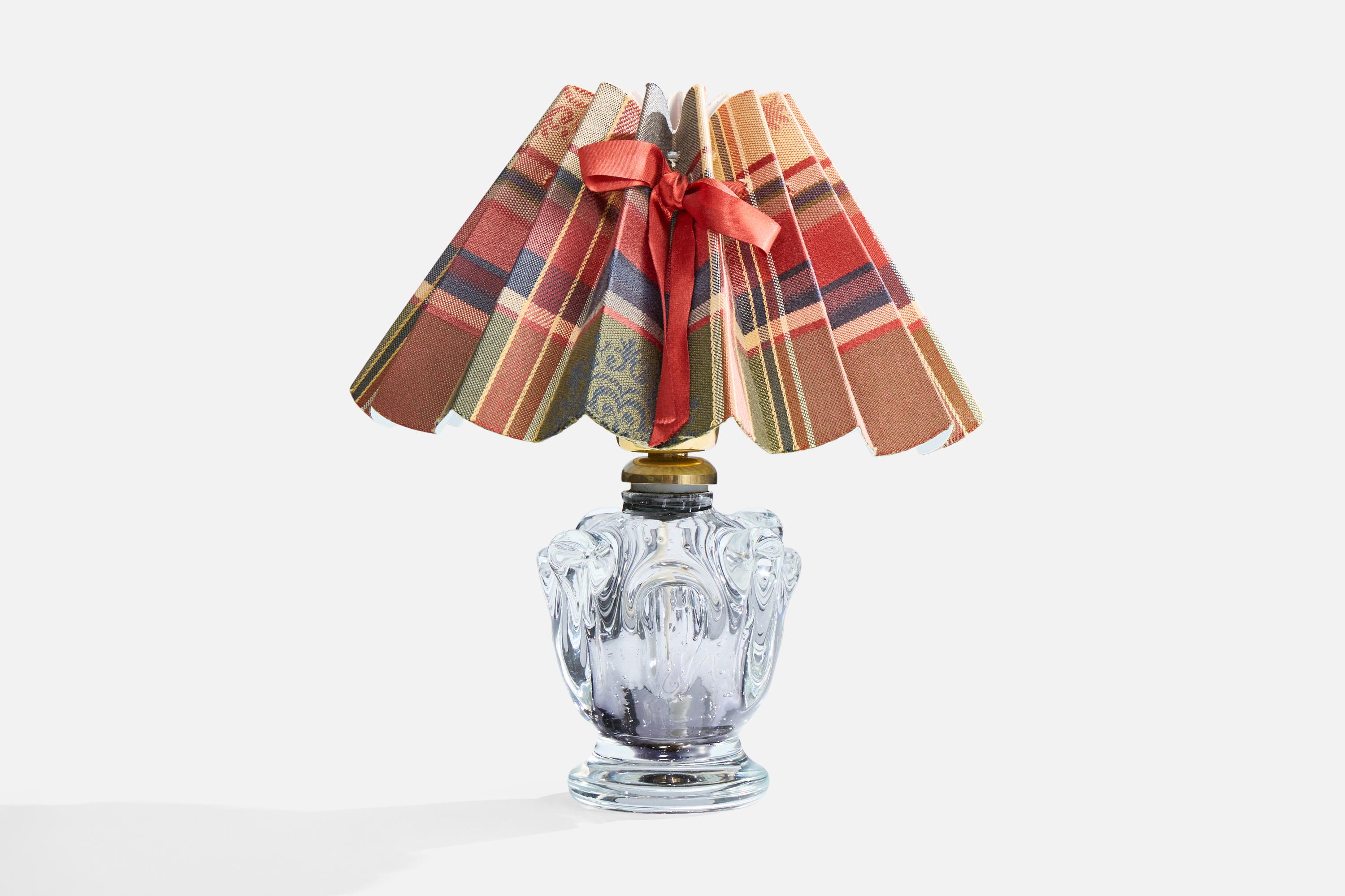 A blown glass, brass and fabric table lamp designed by Börne Augustsson and produced by Åseda Glasbruk, Sweden, c. 1940s.

Dimensions of Lamp with Shade (inches): 9.8