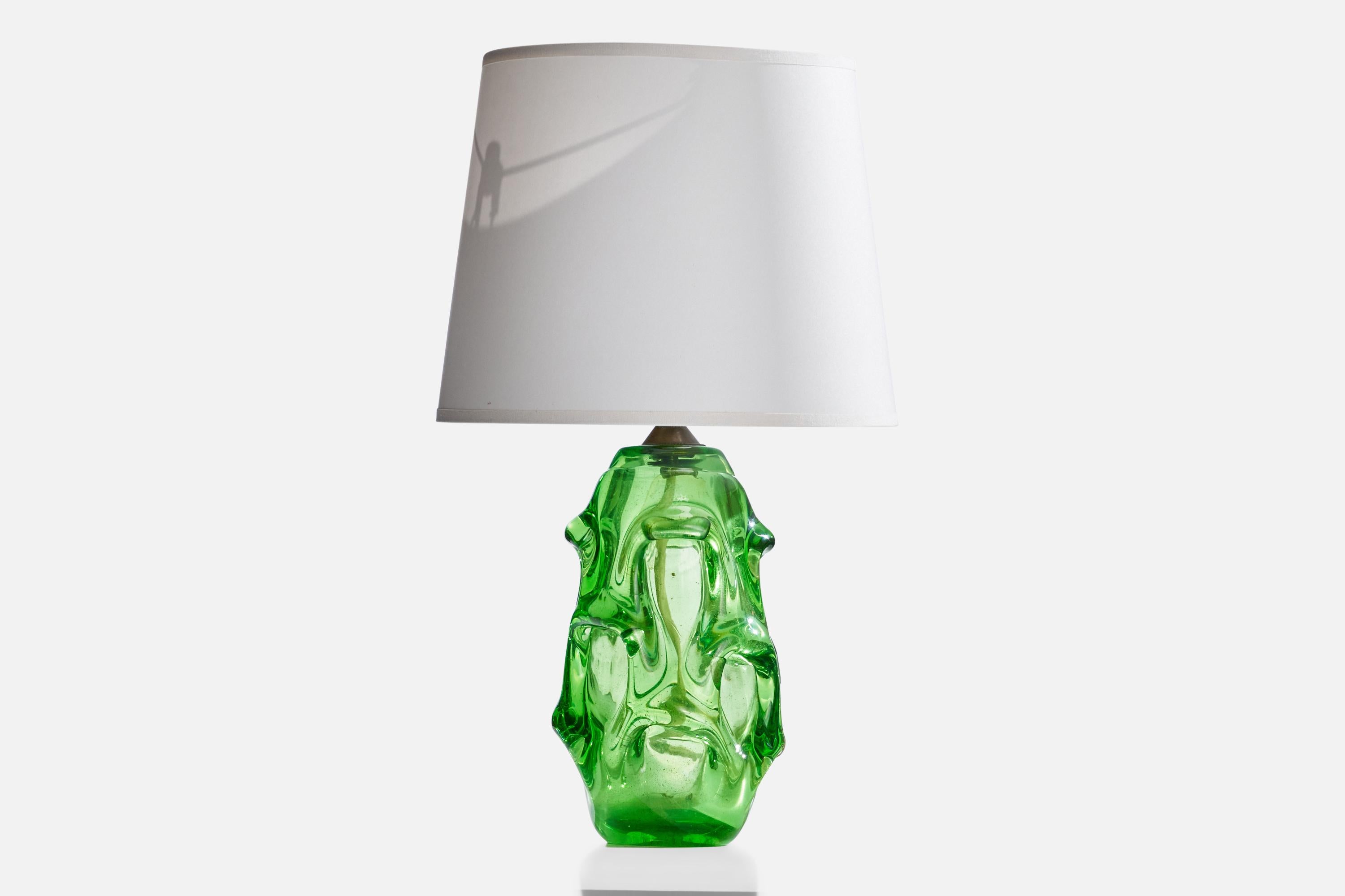 A green blown glass and brass table lamp designed by Börne Augustsson and produced by Åseda Glasbruk, Sweden, 1940s.

Dimensions of Lamp (inches): 13”  H x 4.5” Diameter
Dimensions of Shade (inches): 8” Top Diameter x 10” Bottom Diameter x 8”