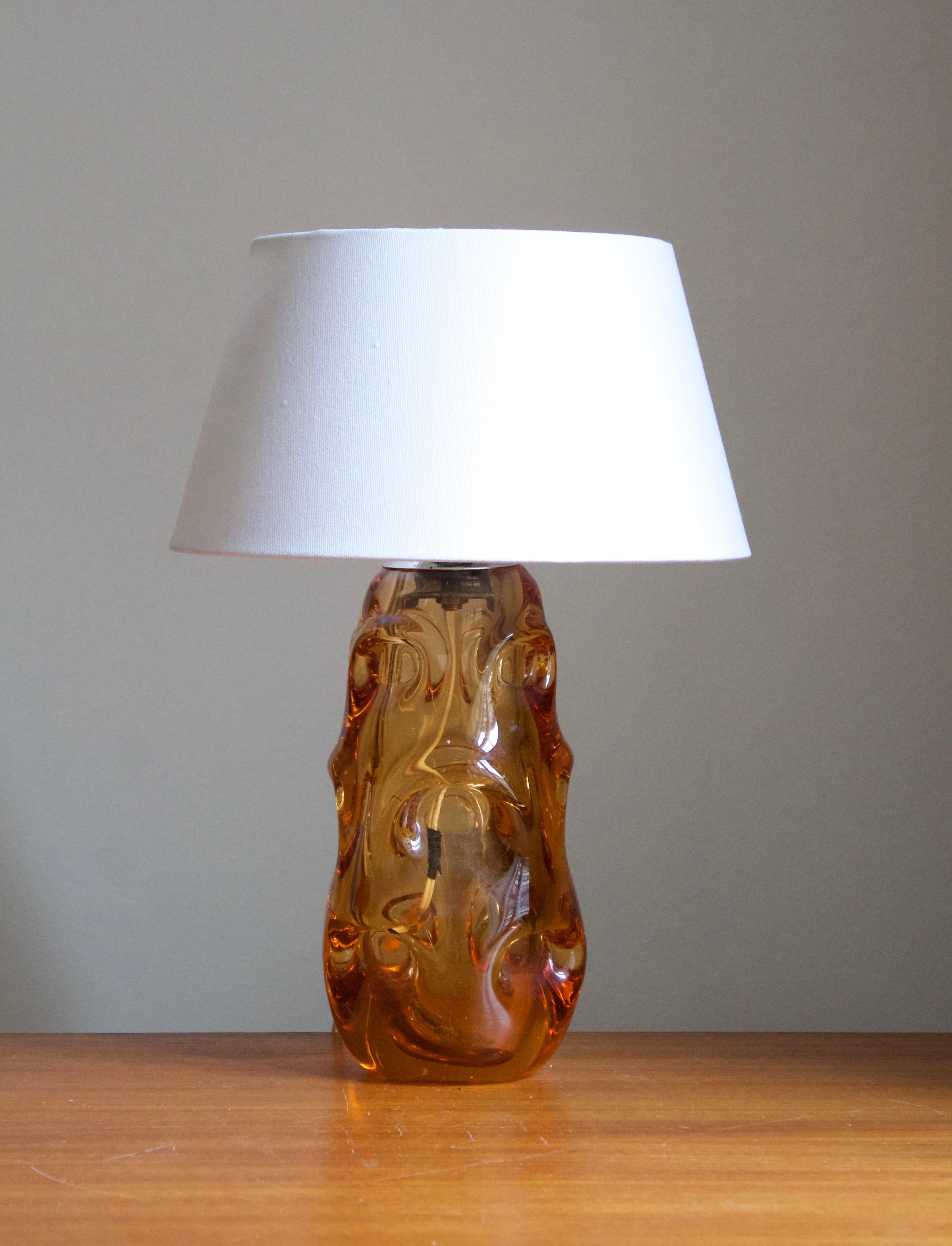 An organic table lamp in highly artistic form. Design attributed to Börne Augustsson, Åseda Sweden, 1950s. 

Stated dimensions exclude lampshade, height includes socket. Sold without lampshade.