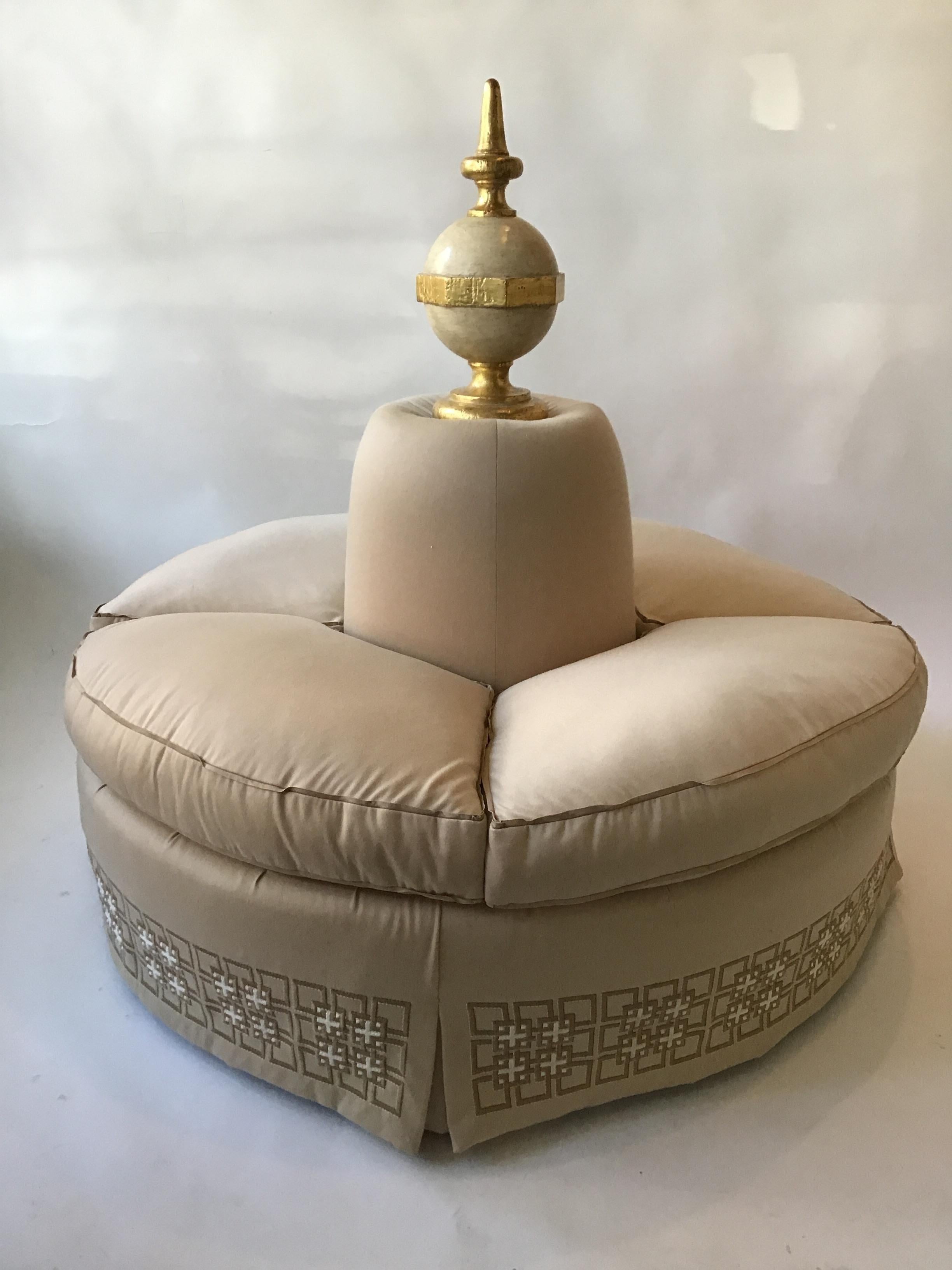 From a celebrities Southampton, NY oceanfront estate. Custom made borne settee covered in worsted wool satin fabric. Custom embroidered detail on skirt. Giltwood finial top. On brass casters.
 