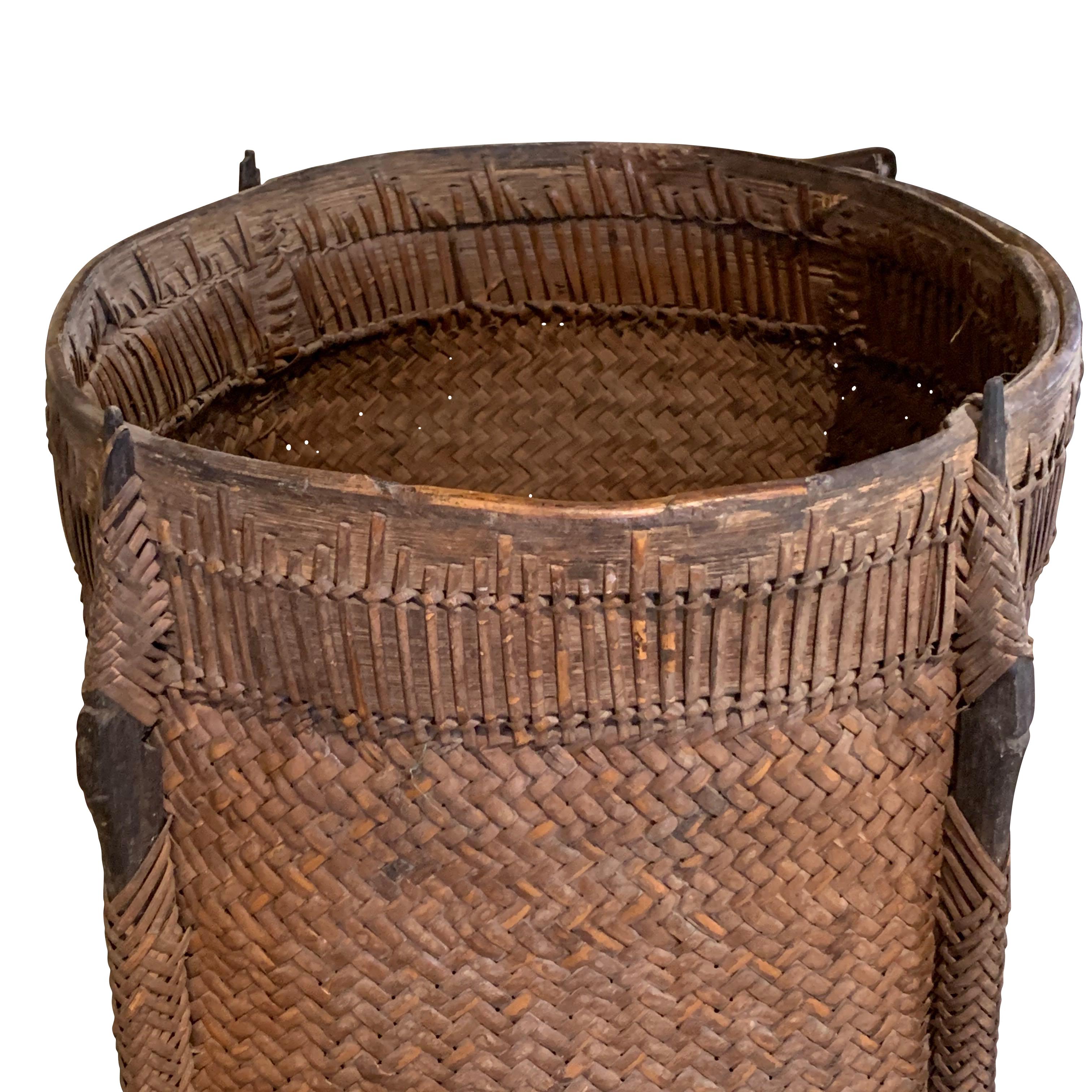 1920s Borneo handwoven basket used to store picked tea leaves
Decorative woven pattern
Square shape with a rounded bottom
Sturdy and functional.
  