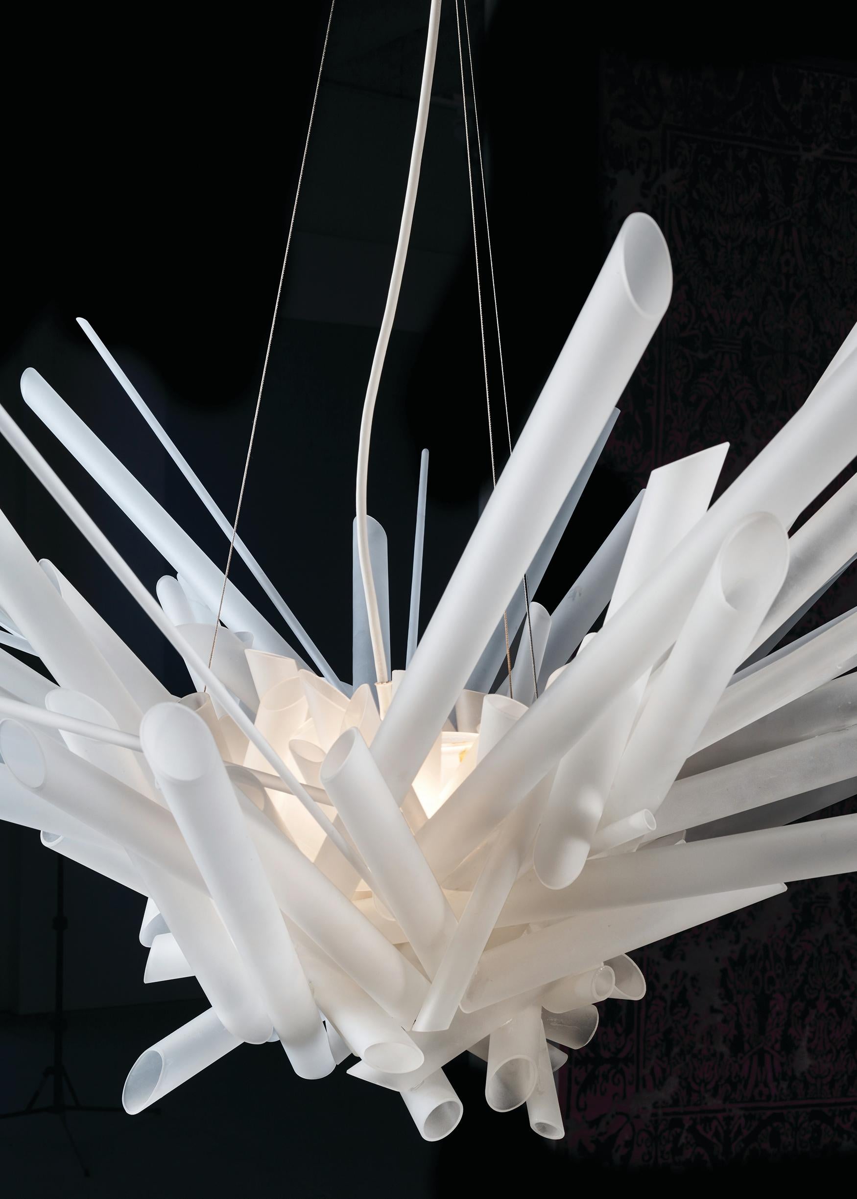 Runner-up Award LAMP 2016 International Lighting Exhibition
The Boro Boro chandelier is constructed solely of glass, except for the stainless steel cable suspension and Xenon bulbs and sockets. The form and placement of these minimally cold-worked,