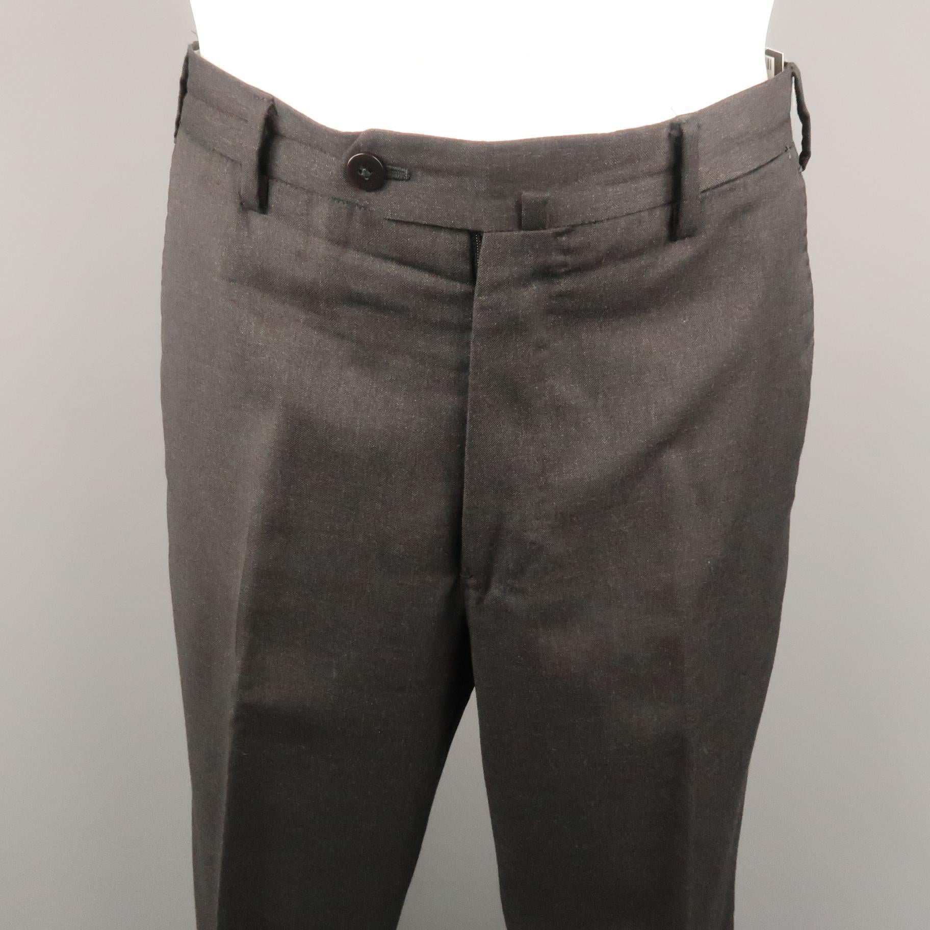 BORRELLI dress pant comes in a charcoal lana wool featuring a flat front style and a zip fly closure. Made in Italy.
 
Excellent Pre-Owned Condition.
Marked: IT 48
 
Measurements:
 
Waist: 32 in.
Rise: 9 in.
Inseam: 28 in.
SKU: 95309
Category: Dress