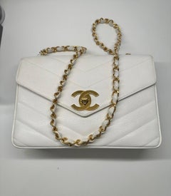 Borsa Chanel caviar chevron jumbo