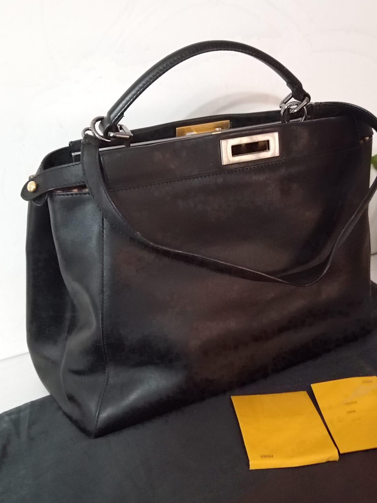 Black Fendi Peekaboo bag with animal pony skin and alcantara interior, Excellent overall condition, complete with dust with foil on metalwork
Iconic bag and suitable for everyone, you can carry it by hand or over the shoulder thanks to the included