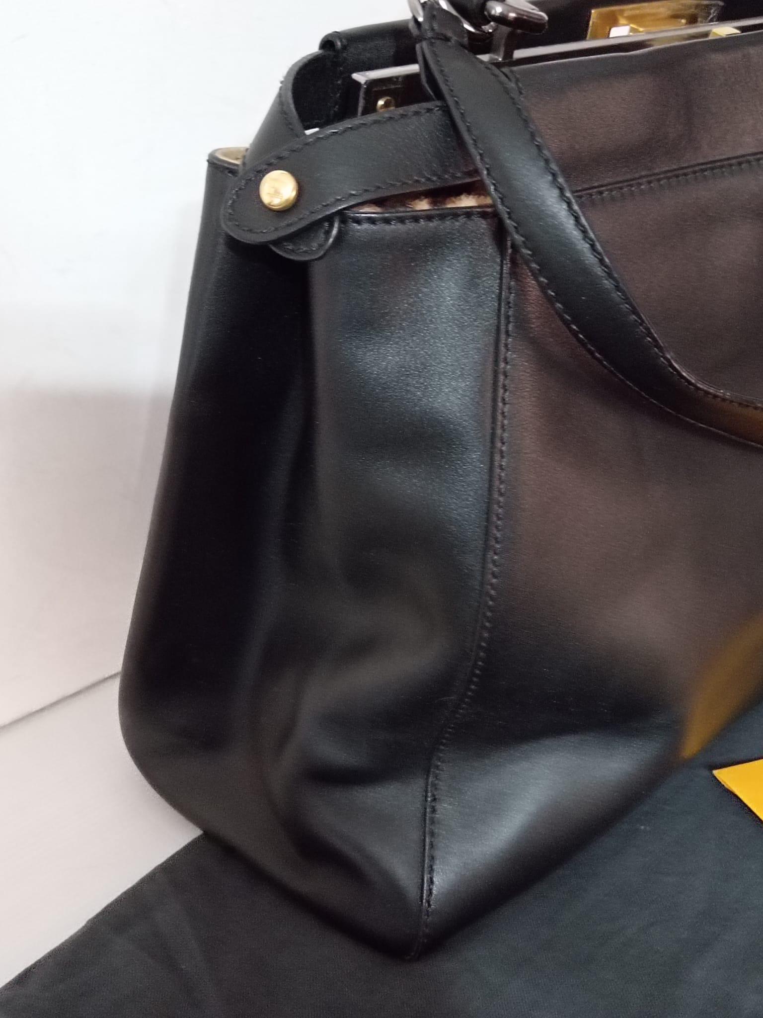 Black Fendi Peekaboo bag with pony skin interior in excellent condition For Sale