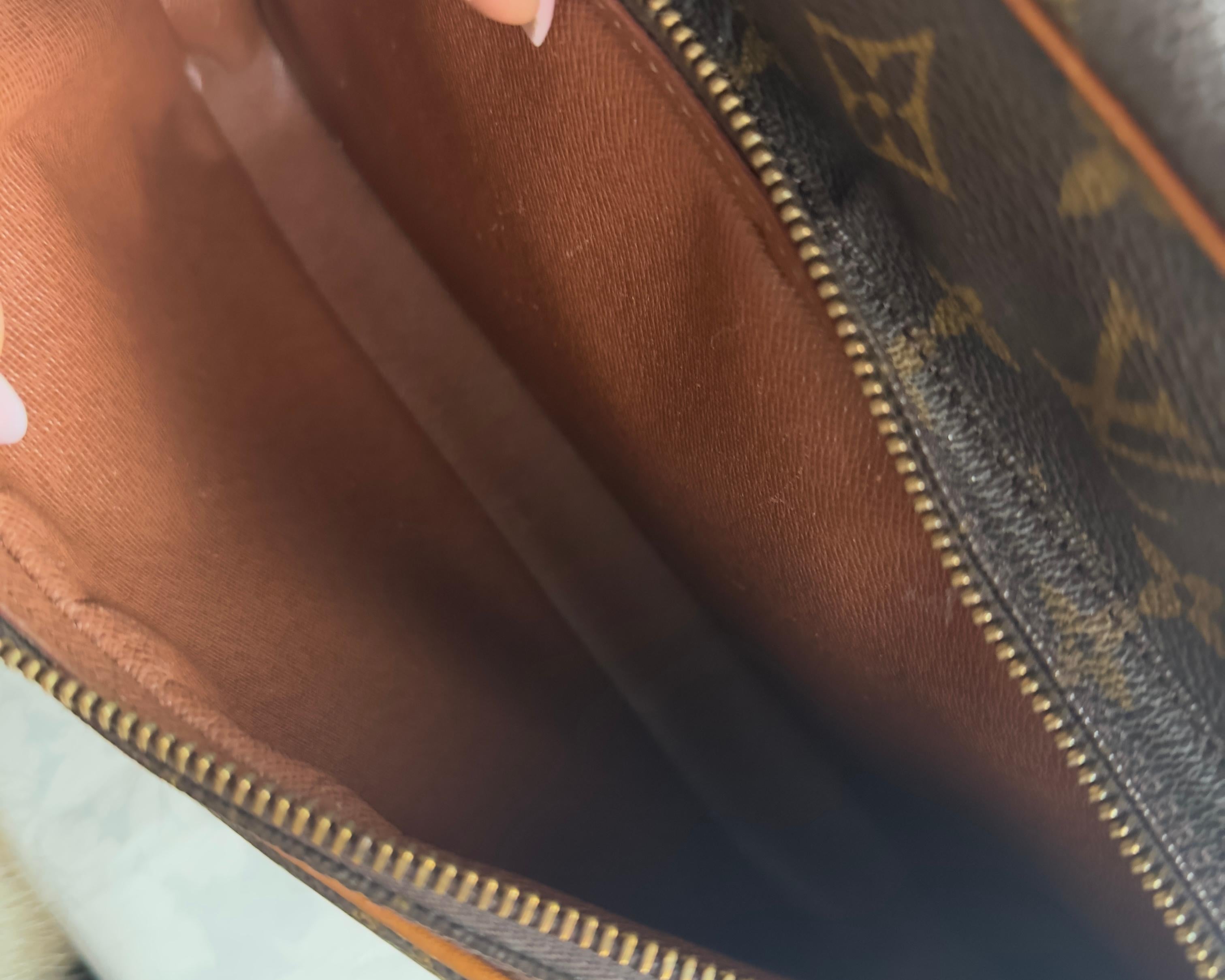 Borsa Louis Vuitton Nile in ottime condizioni 9