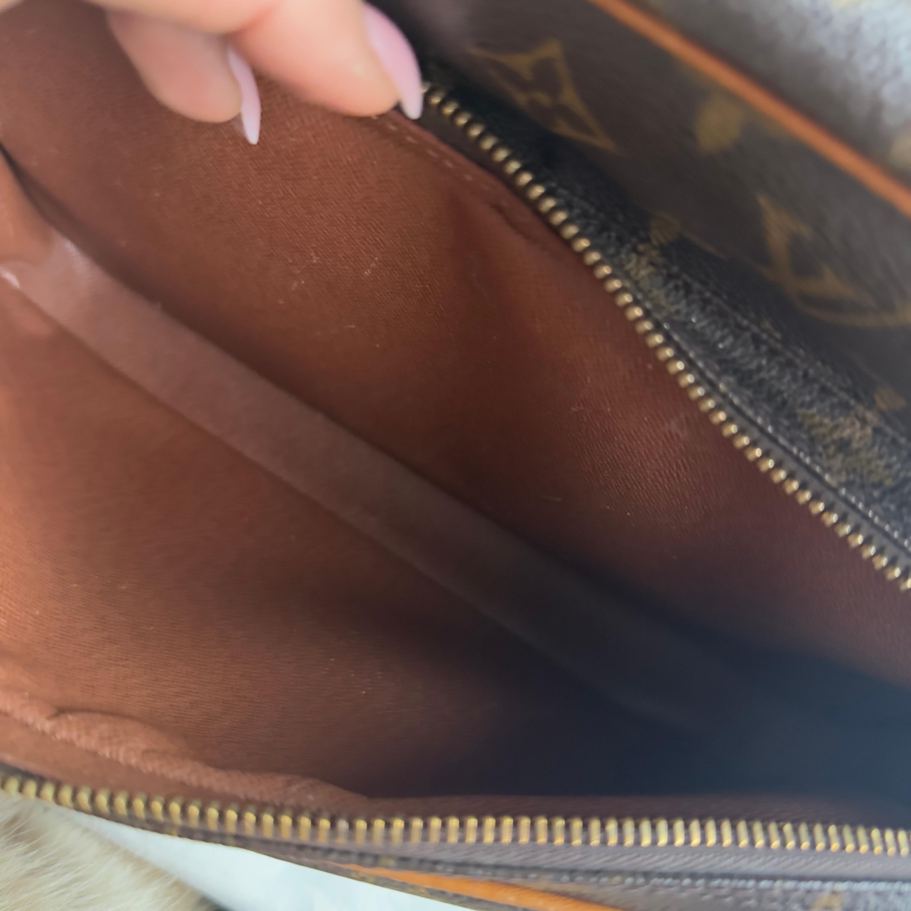 Borsa Louis Vuitton Nile in ottime condizioni 11