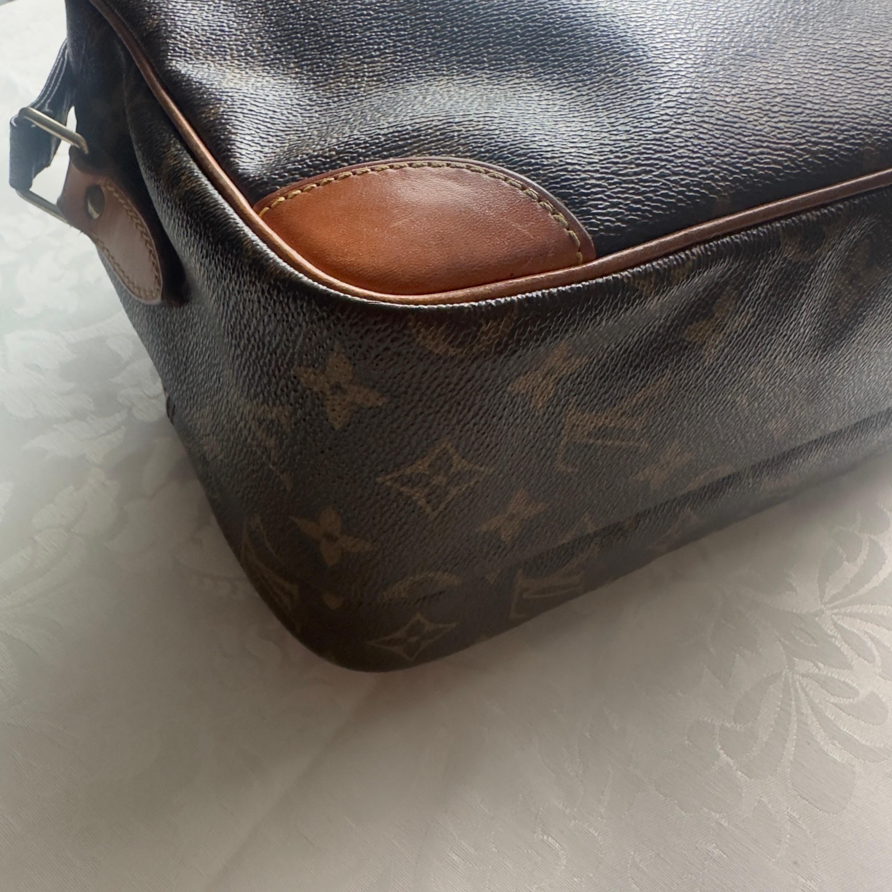 Borsa Louis Vuitton Nile in ottime condizioni 4