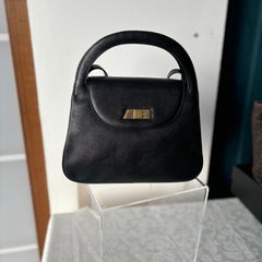 Borsa nera Nina Ricci Paris pari al nuovo