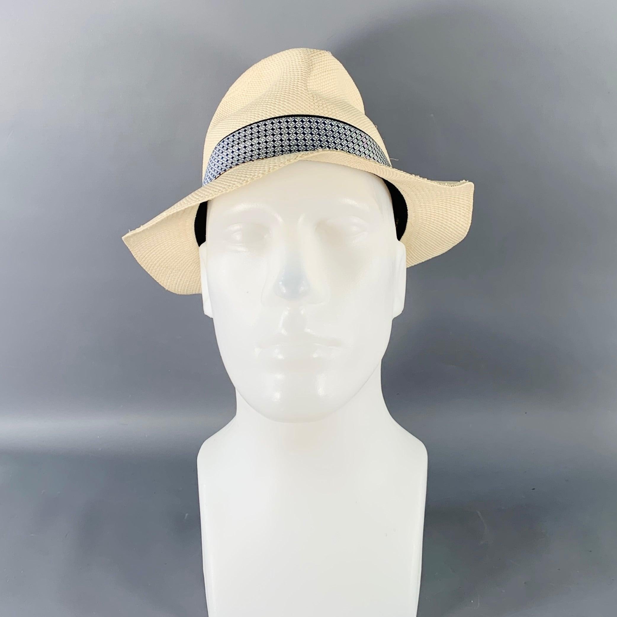 BORSALINO x PORK PIE HATTERS fedora
in a cream woven straw featuring blue geometric patterned hatband. Made in Italy.Excellent Pre-Owned Condition. 

Marked:   M/58 

Measurements: 
  Opening: 22 inches Brim: 2 inches Height: 4.5 inches 
  
  
 
Sui