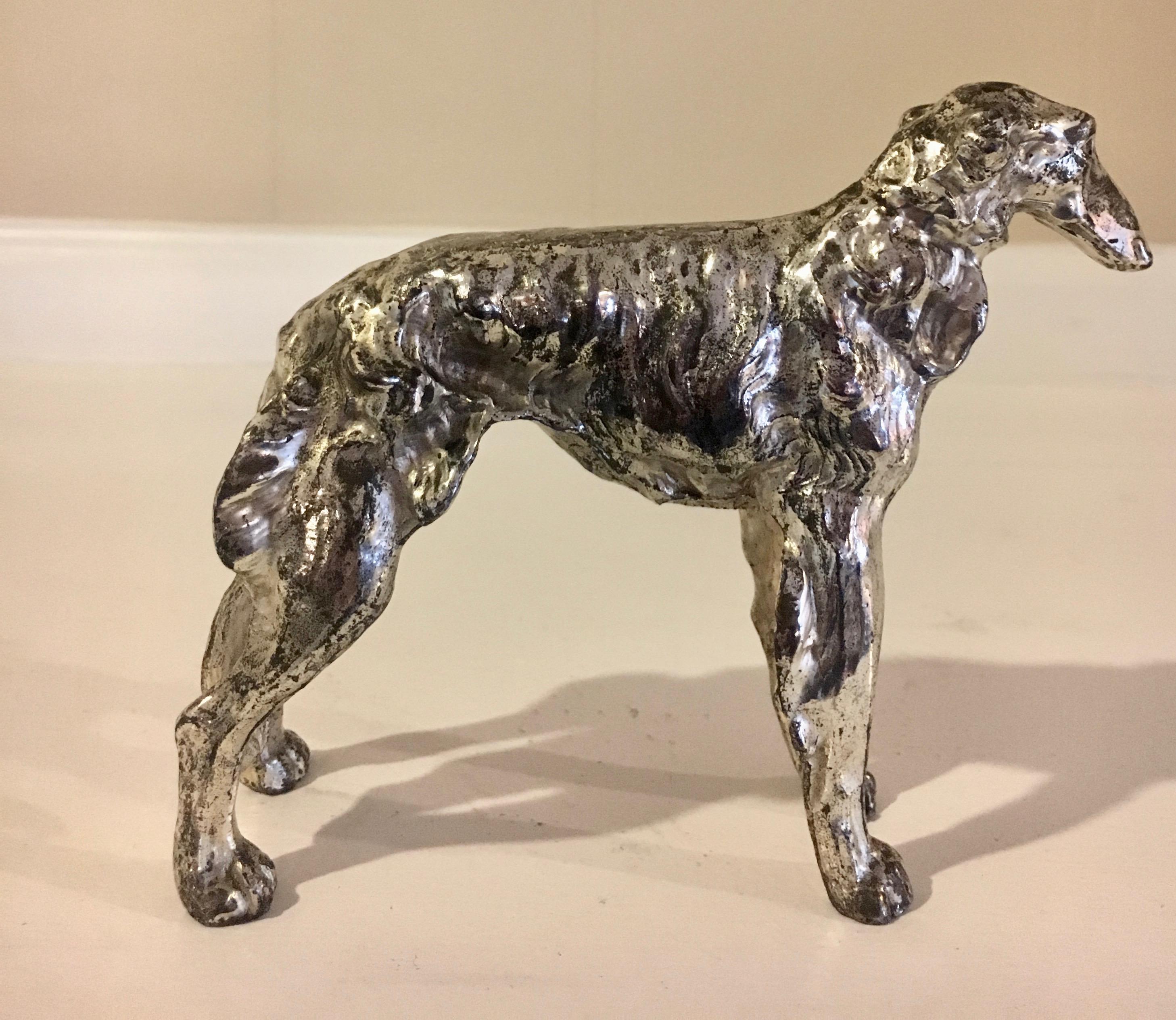 Afghan / Borzoi dog sculpture paper weight - If you are fond of Afghans don't pass this up. A handsome compliment to your desk or shelf in any room. Get your kids a dog that doesn't require walking.

A patinated Silver makes for a lovely finish. The