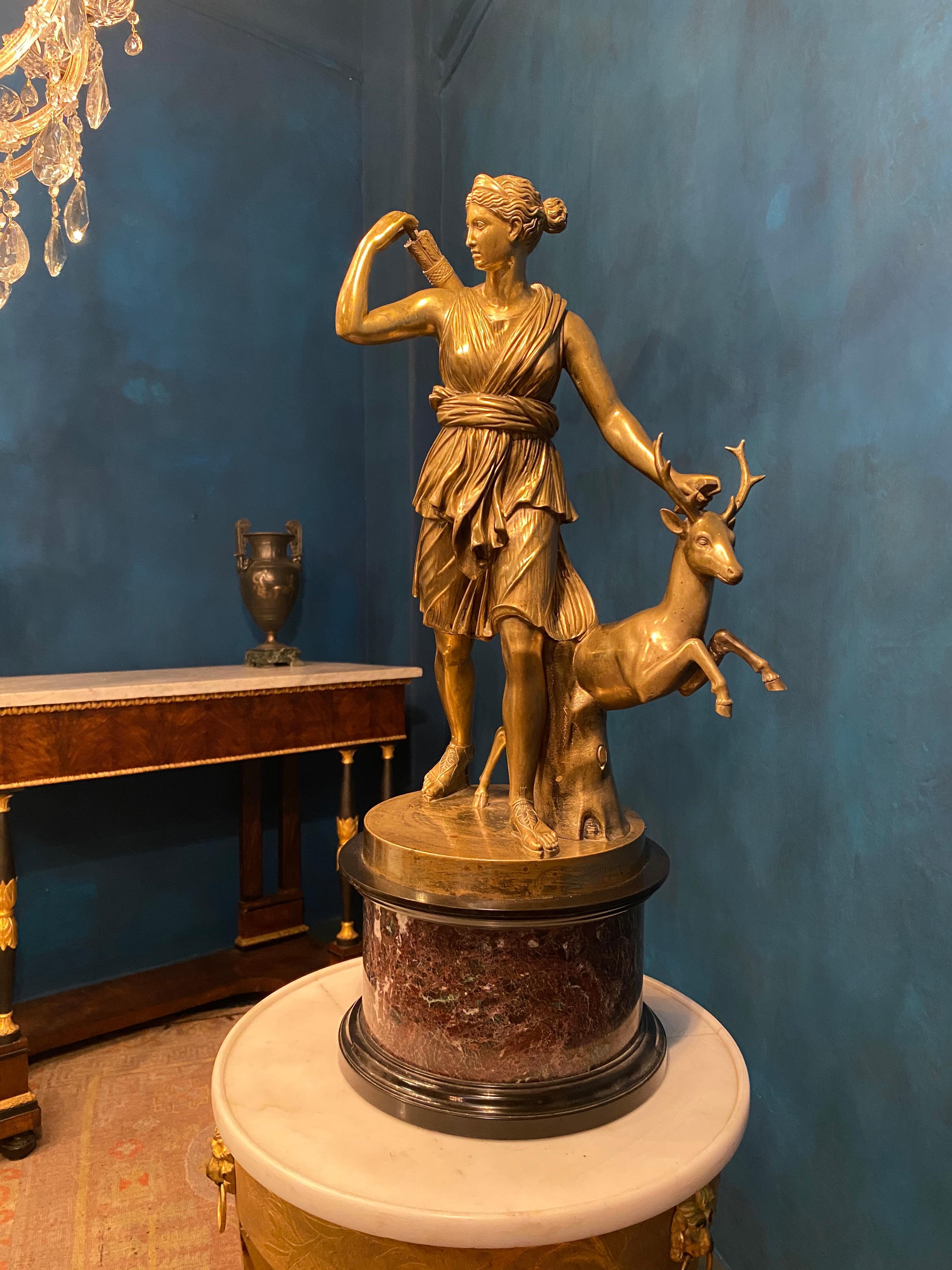 Grand Tour Fine Group of Sculpture in Bronze after a Louvre  Diana of Versailles or Artemis, Goddess of the Hunt.
Diana is represented at the hunt, hastening forward, as if in pursuit of game. She looks toward the right and with raised right arm is