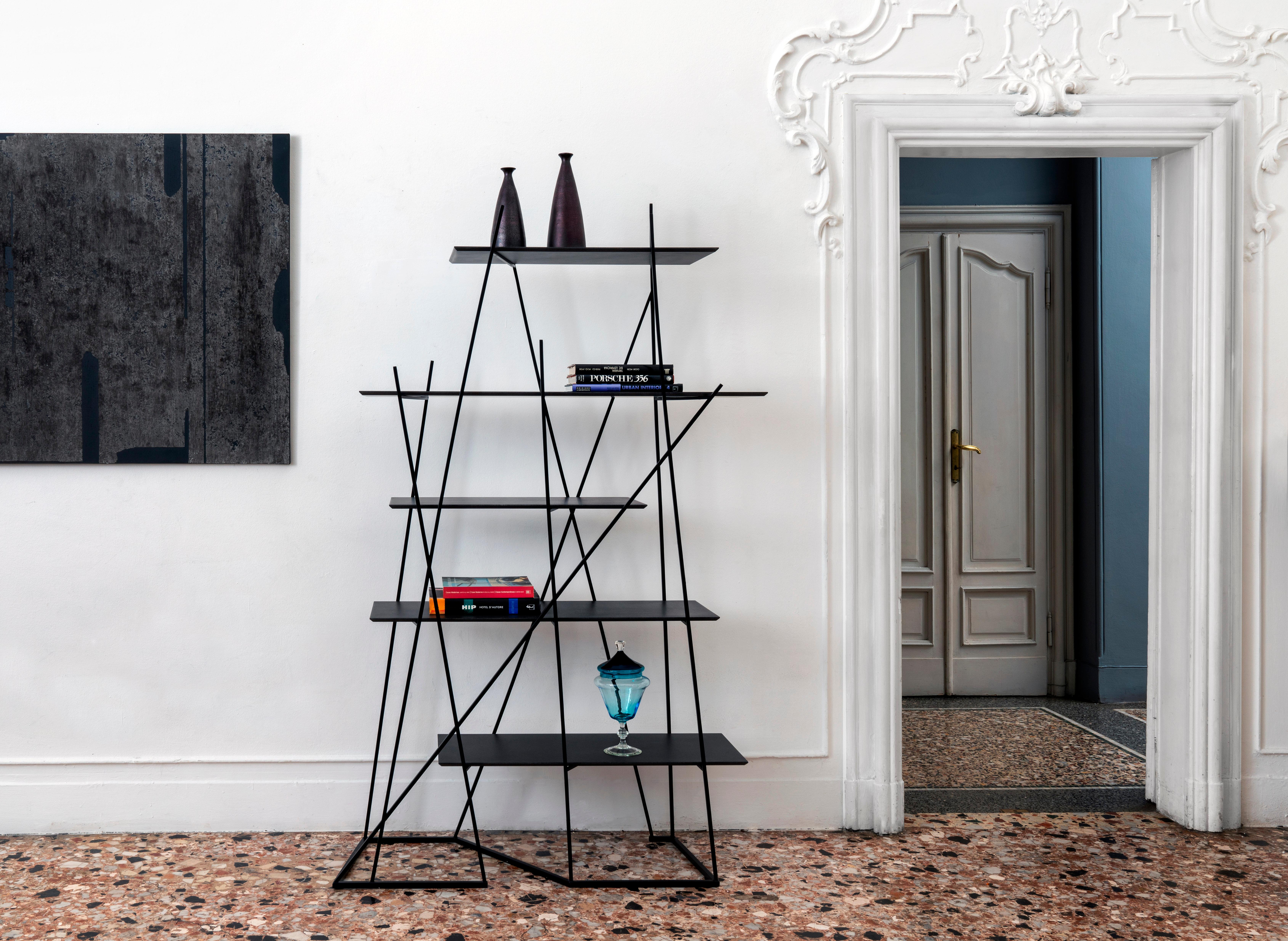 Bosco bookshelf by Mentemano
Dimensions: 116 x 42 x H 190.5 cm
Materials: Natural CDF

Mentemano is a design concept brand leading to a precise matter: is the “mente” (mind) leading the “mano” (hand) to create a piece of furniture or instead the
