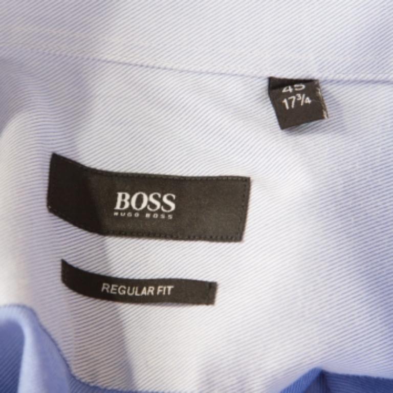 Make a contemporary style statement in this trendy shirt from Boss By Hugo Boss! The blue creation is made of a cotton blend and features sharp collars, front button fastenings and long sleeves. It is sure to lend you a great fit and will be an