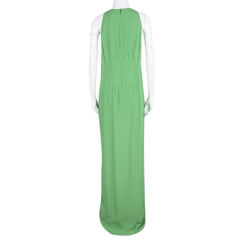 The house of Hugo Boss bring to a chic silhouette to make a timeless fashion statement. This V-Neck maxi dress is elegantly crafted with an inverted pin-tuck design at the waist to add more shape to the ensemble and give you a stylishly