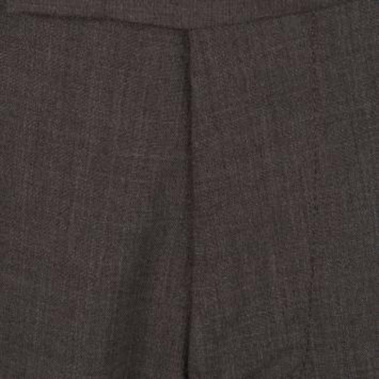 Formality lies in wearing the most formal pair of pants under a dressy shirt finely crafted by Boss- Hugo Boss. It is tailored from good quality blended wool with a clip closure and zippered fly. This pair of trouser will transform your personality