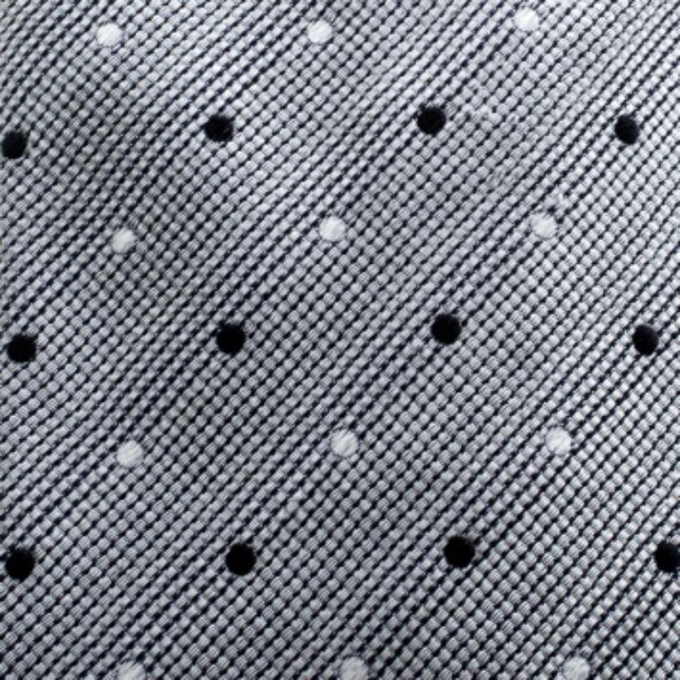 Crafted from 100% silk with a standard length of 9 cm, this polka dotted tie in jacquard is made to grab attention. The Boss by Hugo Boss monochrome creation can be paired with your formal suits for a sophisticated look.