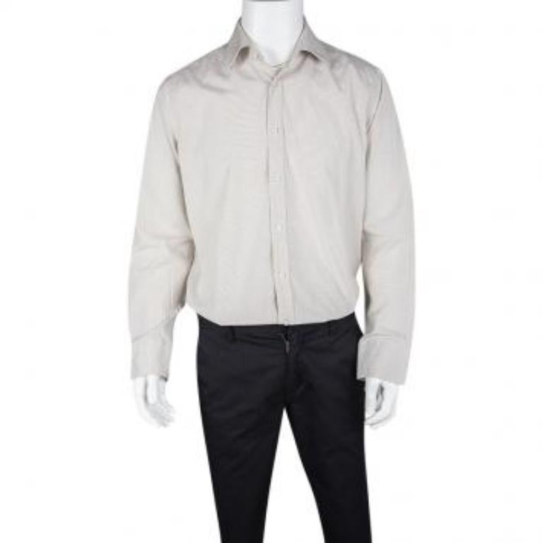 Your formal clothing style deserves an addition as stylish as this shirt from Boss by Hugo Boss! It has been tailored from cotton and designed with a collar, front buttons, and checks all over.