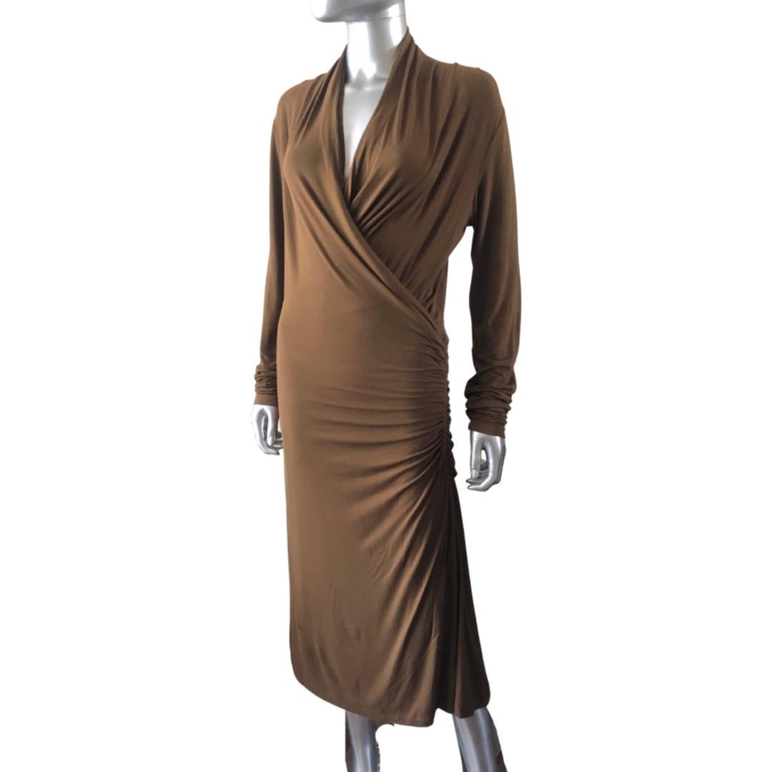 What a sexy modern. minimalist dress! Made in Italy for the Boss/ Hugo Boss label. Size L, made of a fine European Viscose blend jersey fabric in a sexy and moder tobacco color. the dress pulls on with a v neck and draped side seam. Even sexier, is