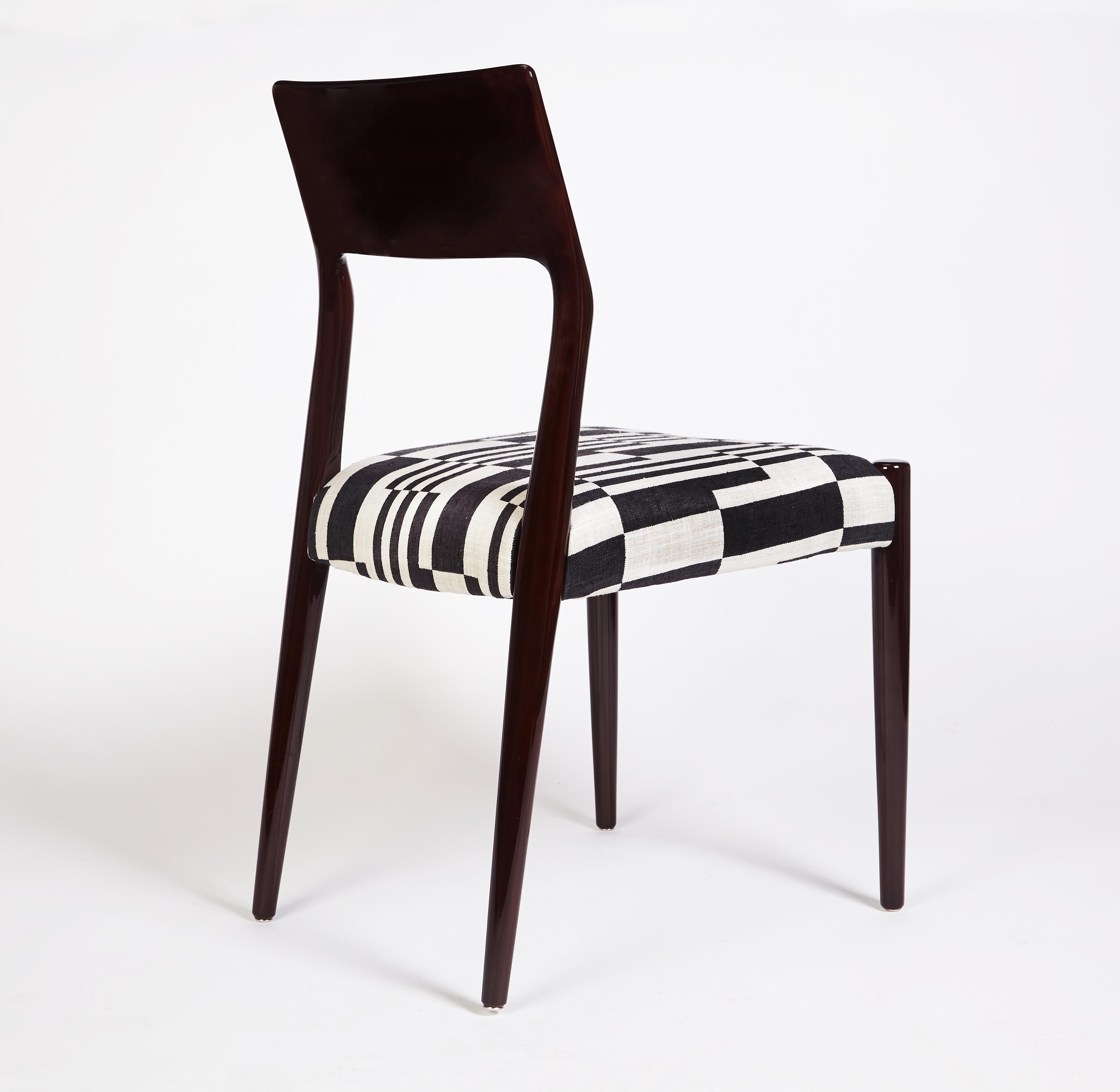 Bossa Chair, in Mahogany Wood, Handcrafted in Portugal by Duistt

The “Bossa” collection is inspired by the subtlety, particular charm, and harmonious simplicity of the Brazilian music movement that emerged in the late 50s, “Bossanova”. With