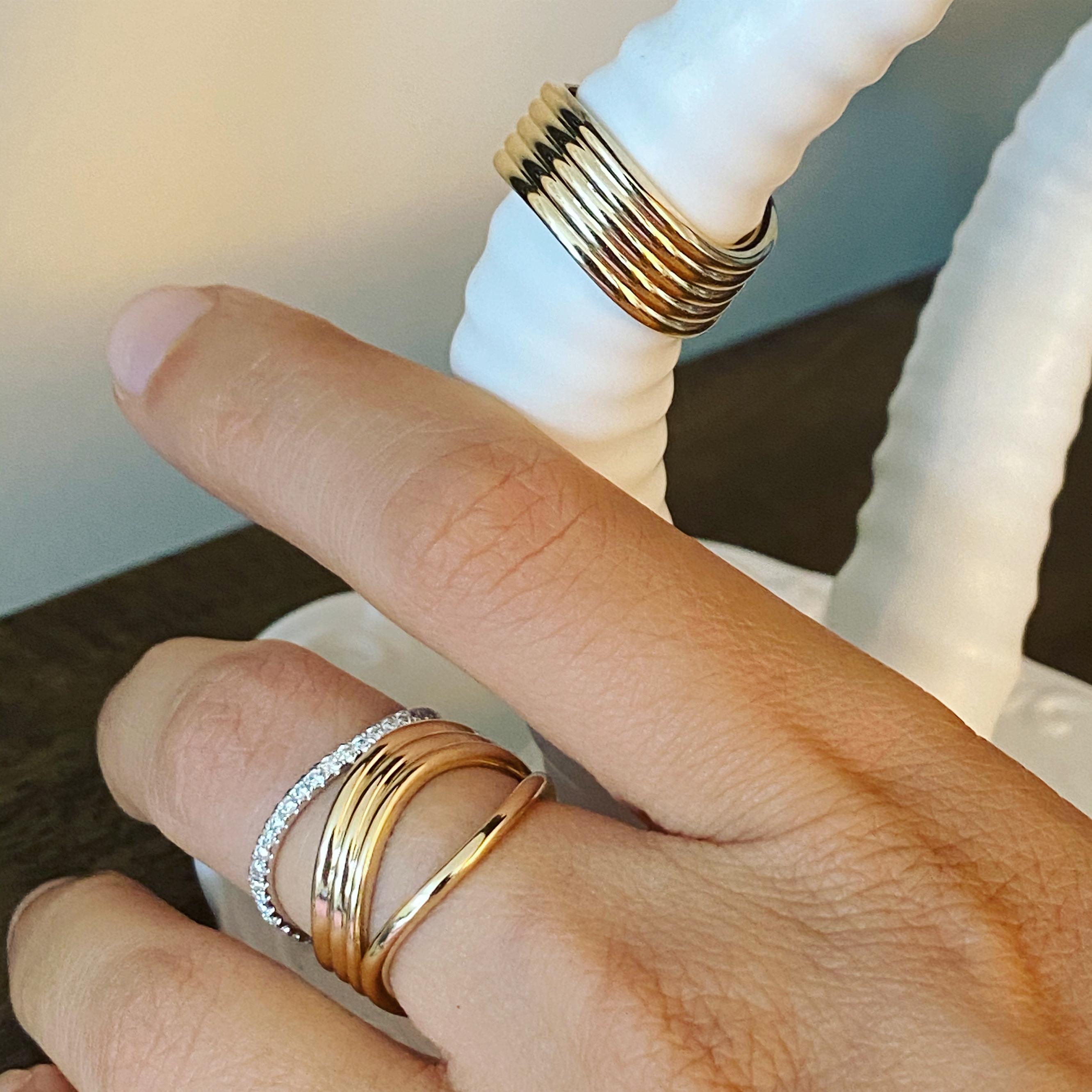 Consisting of an elegant undulating wave of three thin bands, our Bossa Nova Trio Ring looks lovely on its own or stacked with other rings from our Bossa Nova series (available as a set with the diamond version here). Also works great as a masculine
