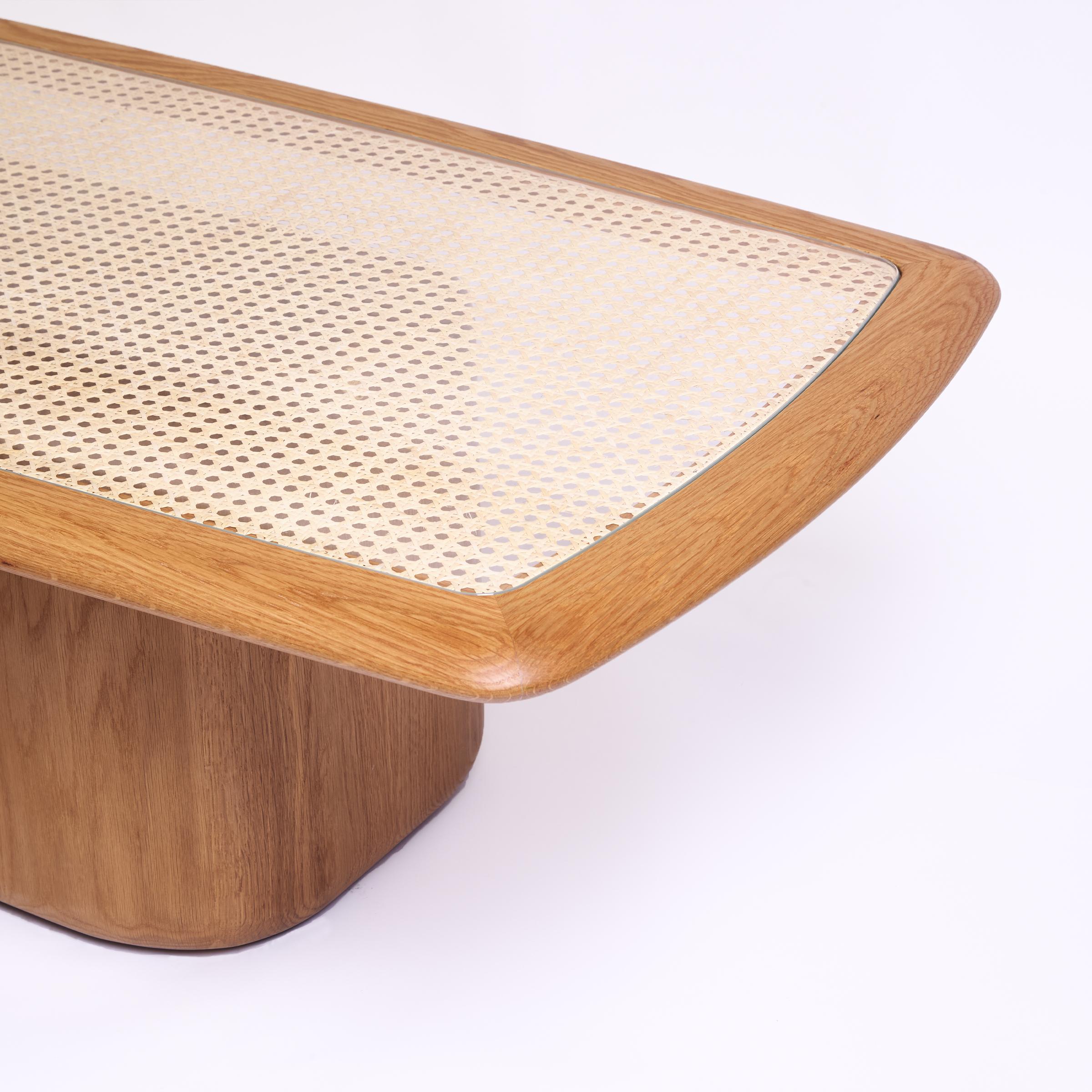 Bossa Rectangular Coffee Table Cane Top, Natural Solid Oak Wood, Handcrafted by Duistt

The “Bossa” collection is inspired by the subtlety, particular charm, and harmonious simplicity of the Brazilian music movement that emerged in the late ’50s,