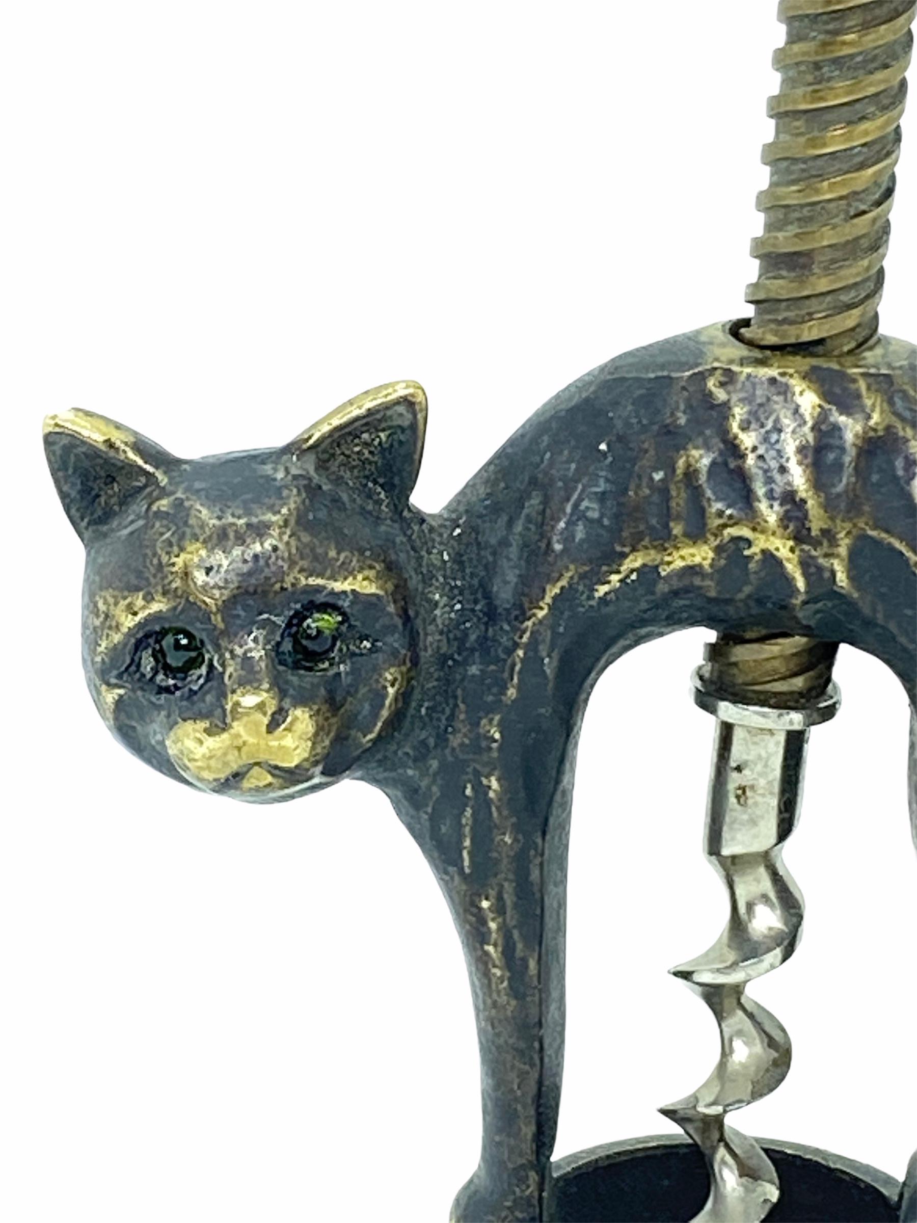 Classic early 1950s Austrian Baller corkscrew in the form of a Halloween cat. Nice addition to your room or just for your collection of Austrian bronze items. Found at an estate sale in Vienna, Austria. The cat has glass eyes.