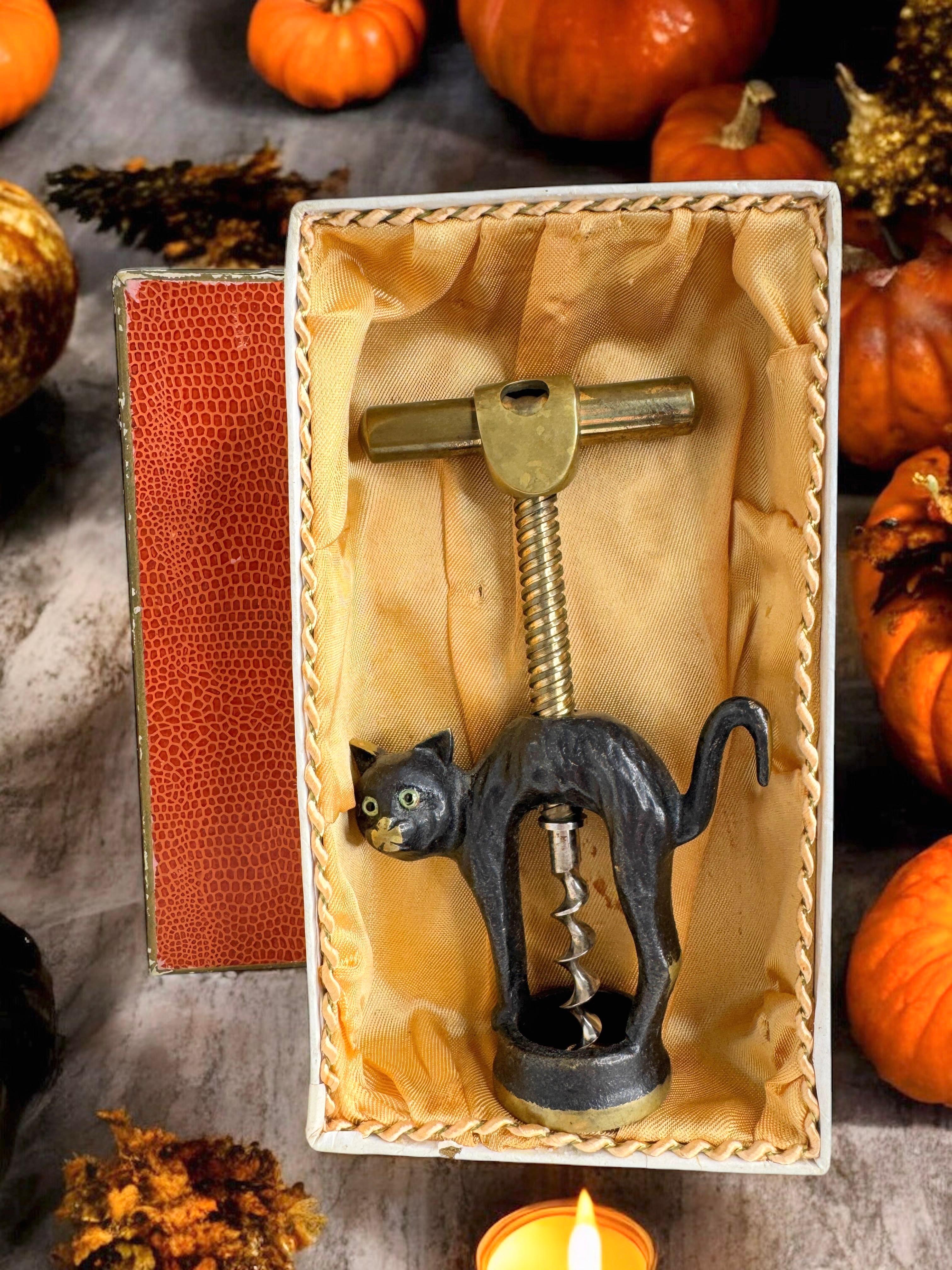 Classic early 1950s Austrian corkscrew in the form of a Halloween cat. Nice addition to your room or just for your collection of Austrian bronze items. Found at an estate sale in Vienna, Austria. It comes in the original old box, box with age and