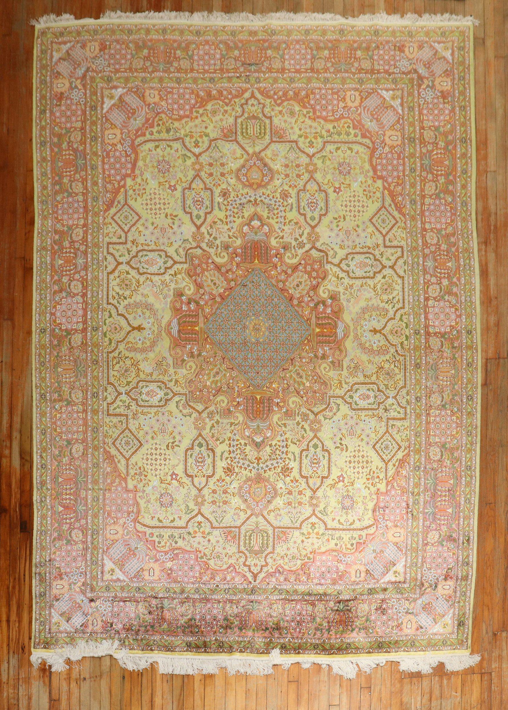 An extraordinary early 20th century Persian Mohtashem Kashan silk room size rug highlighted by a light green field.

Measures: 8'4'' x 11'5''.

