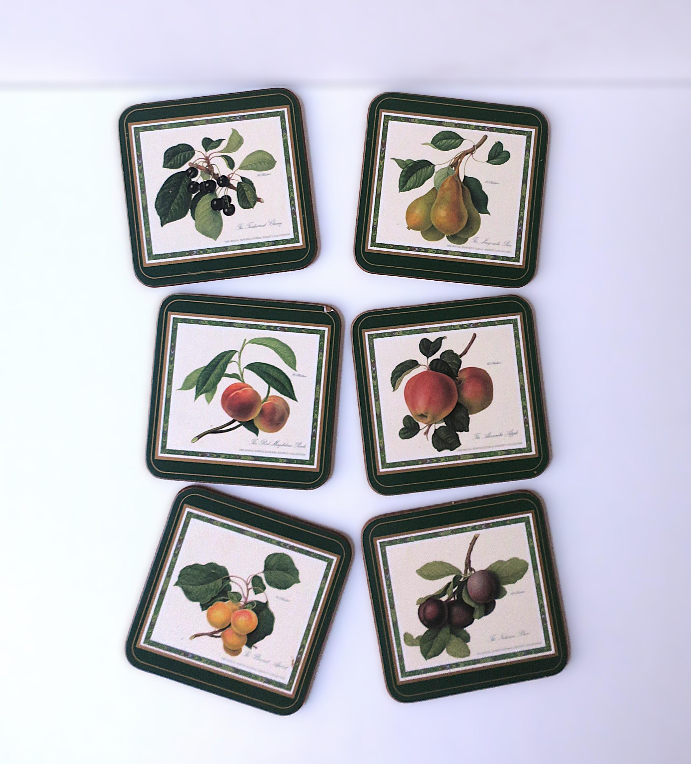 A beautiful set of six (6) English cocktail drinks coasters with botanical fruit design, circa late-20th century, England. Fruits shown include the Tradescant cherry, Jargonelle pear, red Magdalene peach, Alexander apple, Brussels apricot, and the