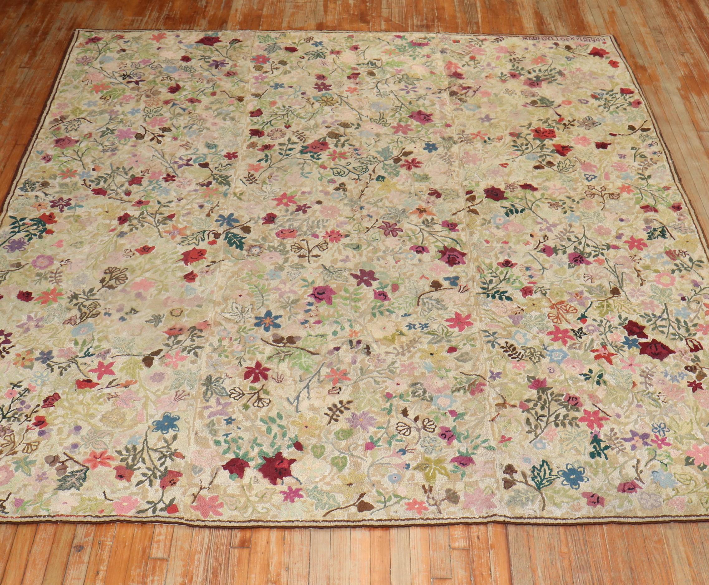 An American Hooked Square Floral Botanical carpet custom-made in 1949. It reads 
