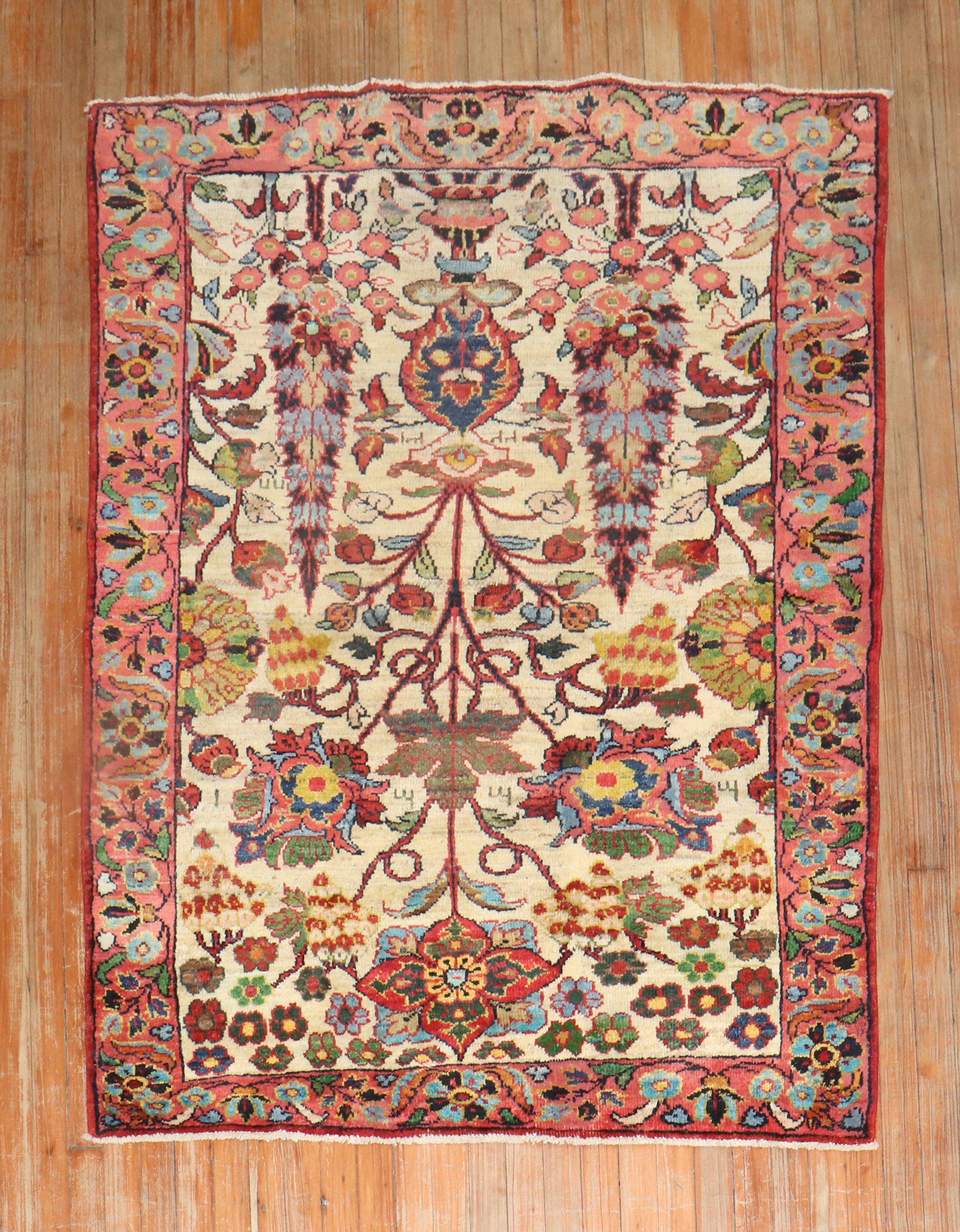 A mid 20th Century Turkish Anatolian Rug with a jewel-toned colorful floral design resembling rugs from the Persian Bakhtiari Village.

Measures: 4'2''x 5'9''.