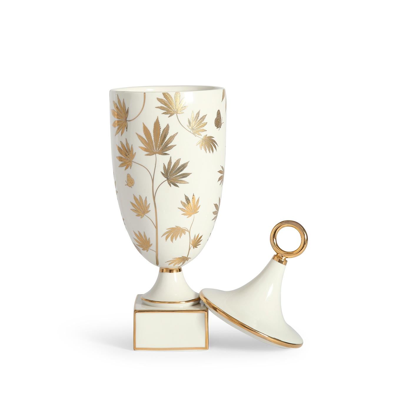 Natural Selections. Observe the science of chic. Limited-quantity editions, our Botanist vessels elevate your everyday look at leaf and wing. Glossy high-fired porcelain wrapped in shimmering gold silhouettes, our Ganja Urn is the perfect bougie